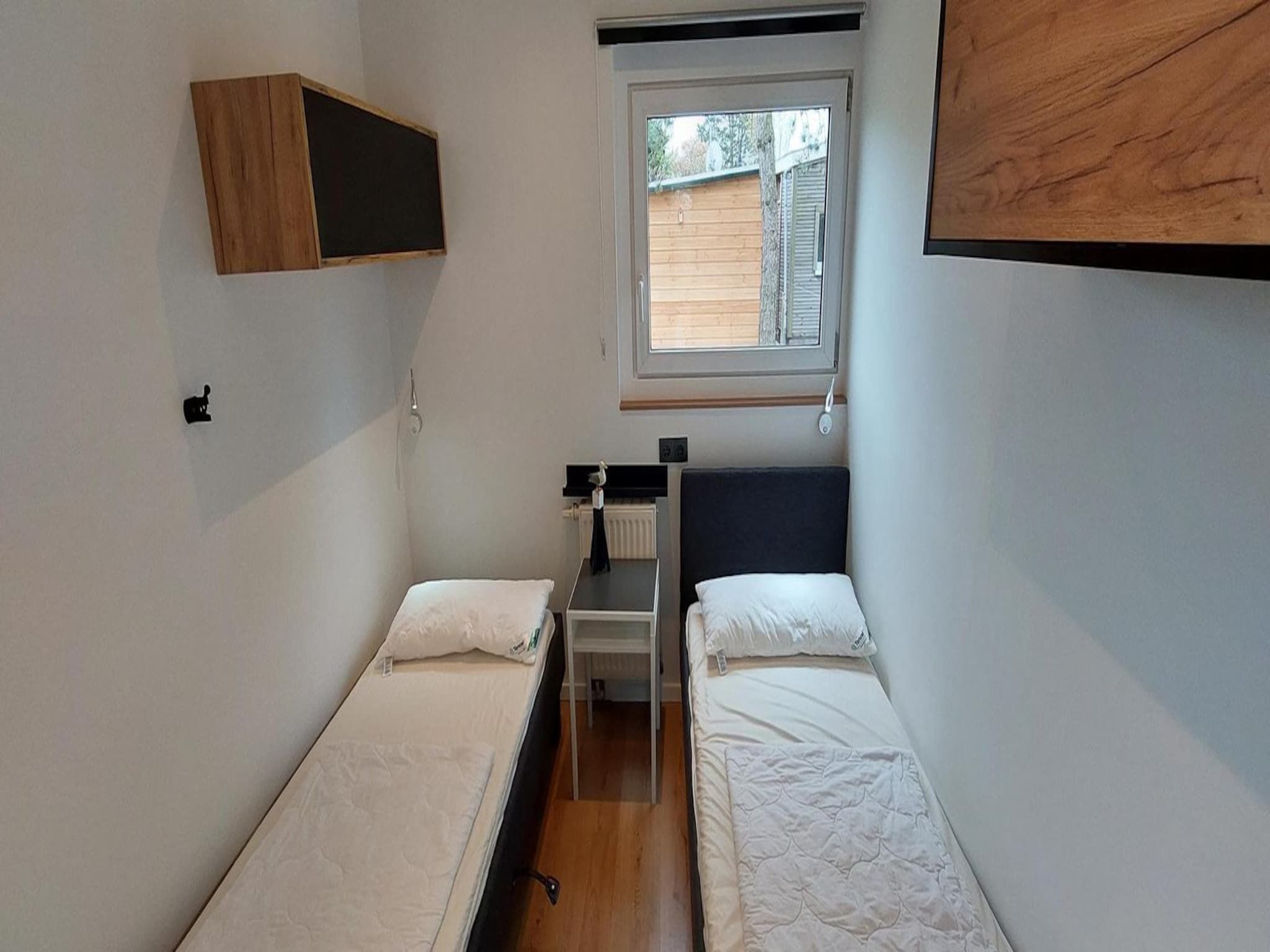 Een slaapkamer van Eureka 13 in Sint Maartenszee