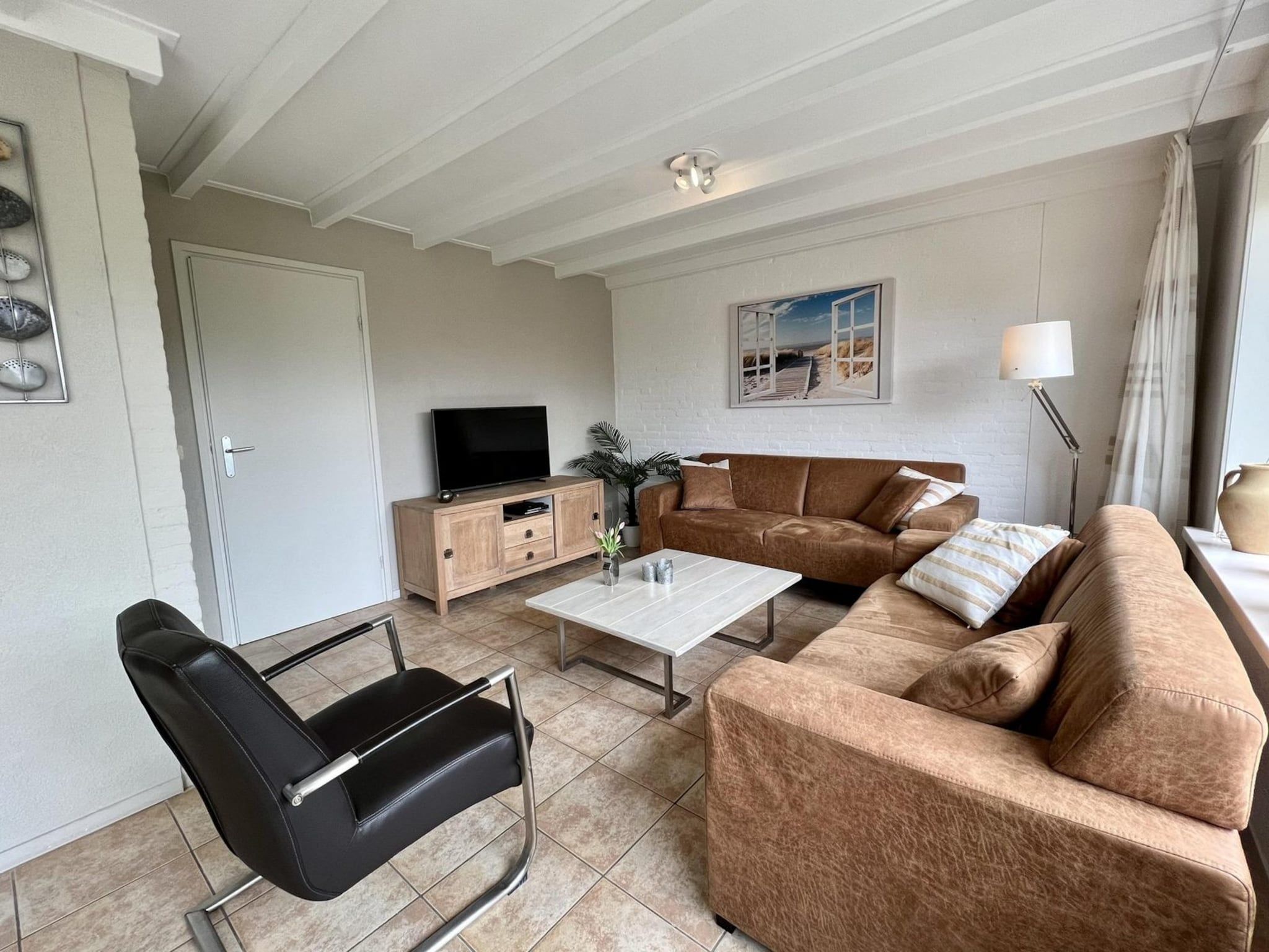 De woonkamer van De Schelp 26 in Sint Maartenszee