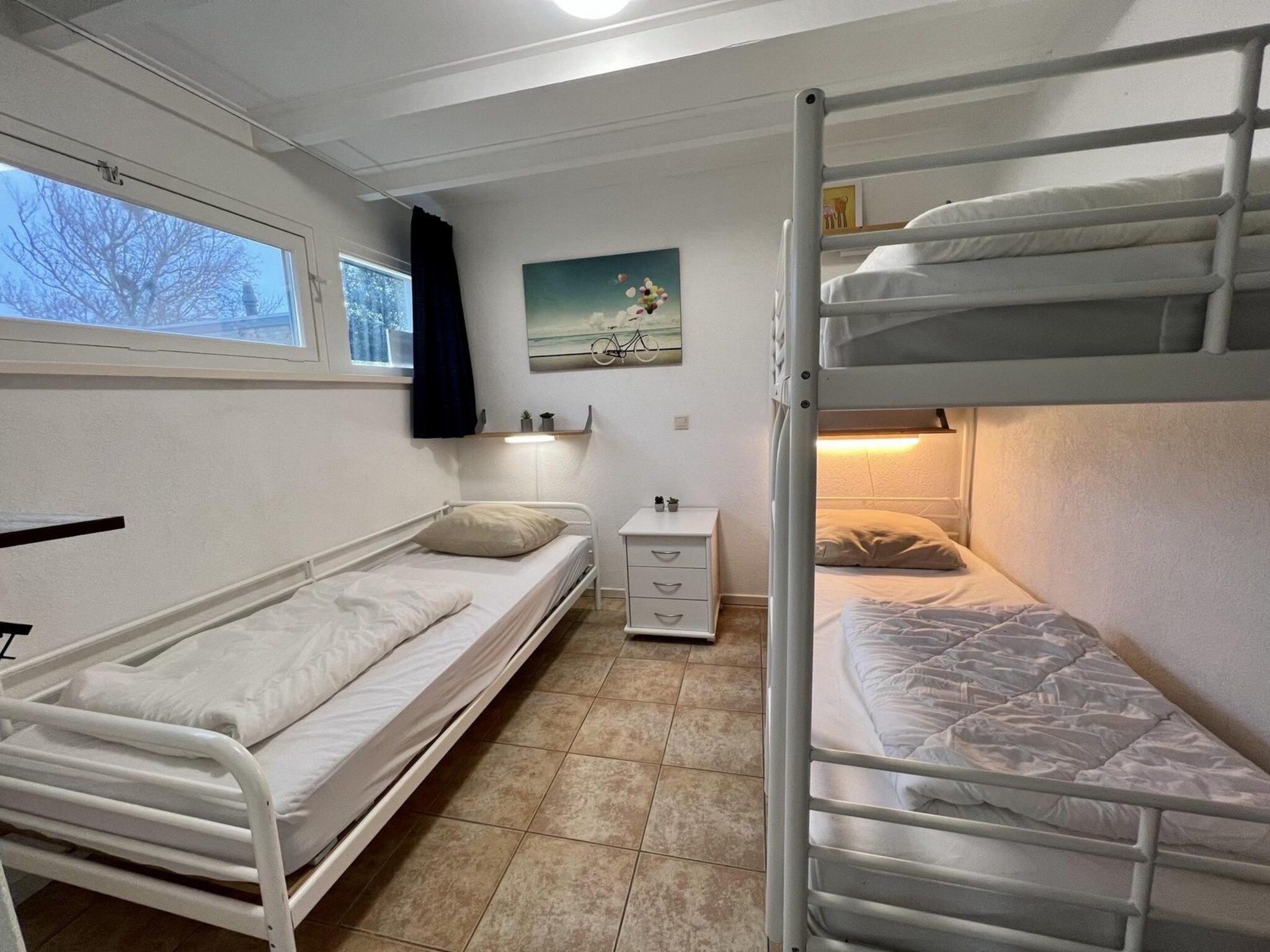 Een slaapkamer van De Schelp 26 in Sint Maartenszee