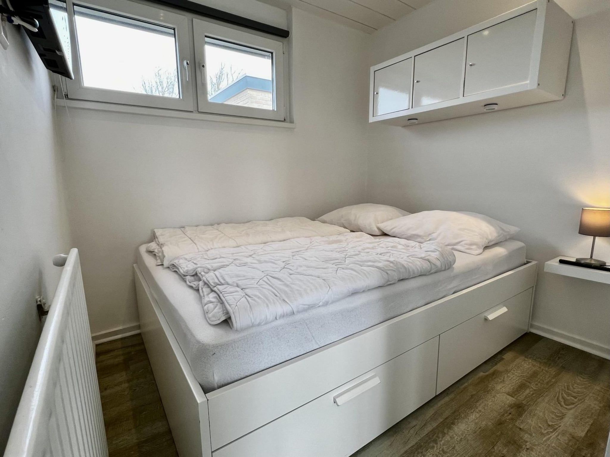 Een slaapkamer van De Schelp 27 in Sint Maartenszee
