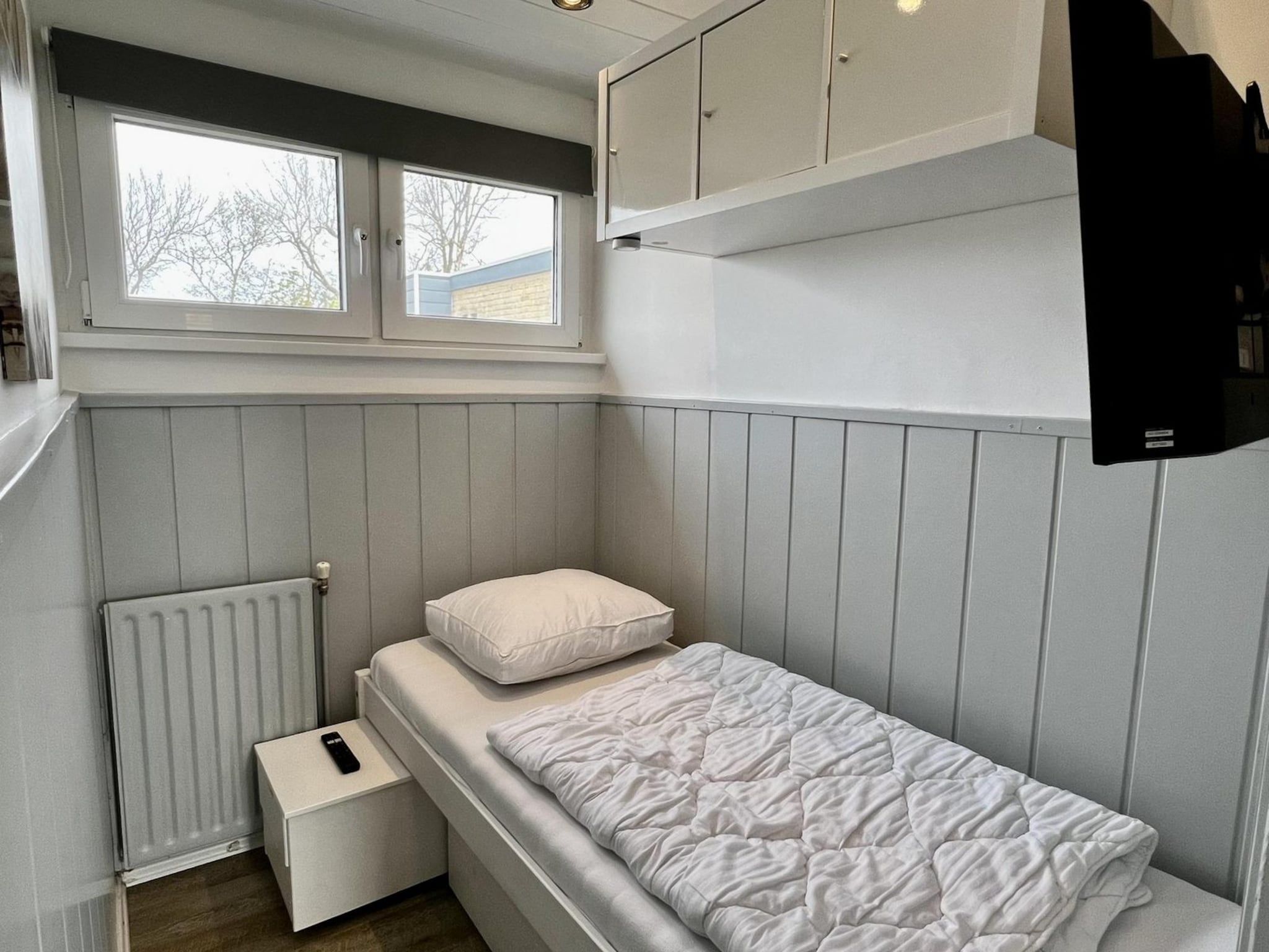 Een slaapkamer van De Schelp 27 in Sint Maartenszee