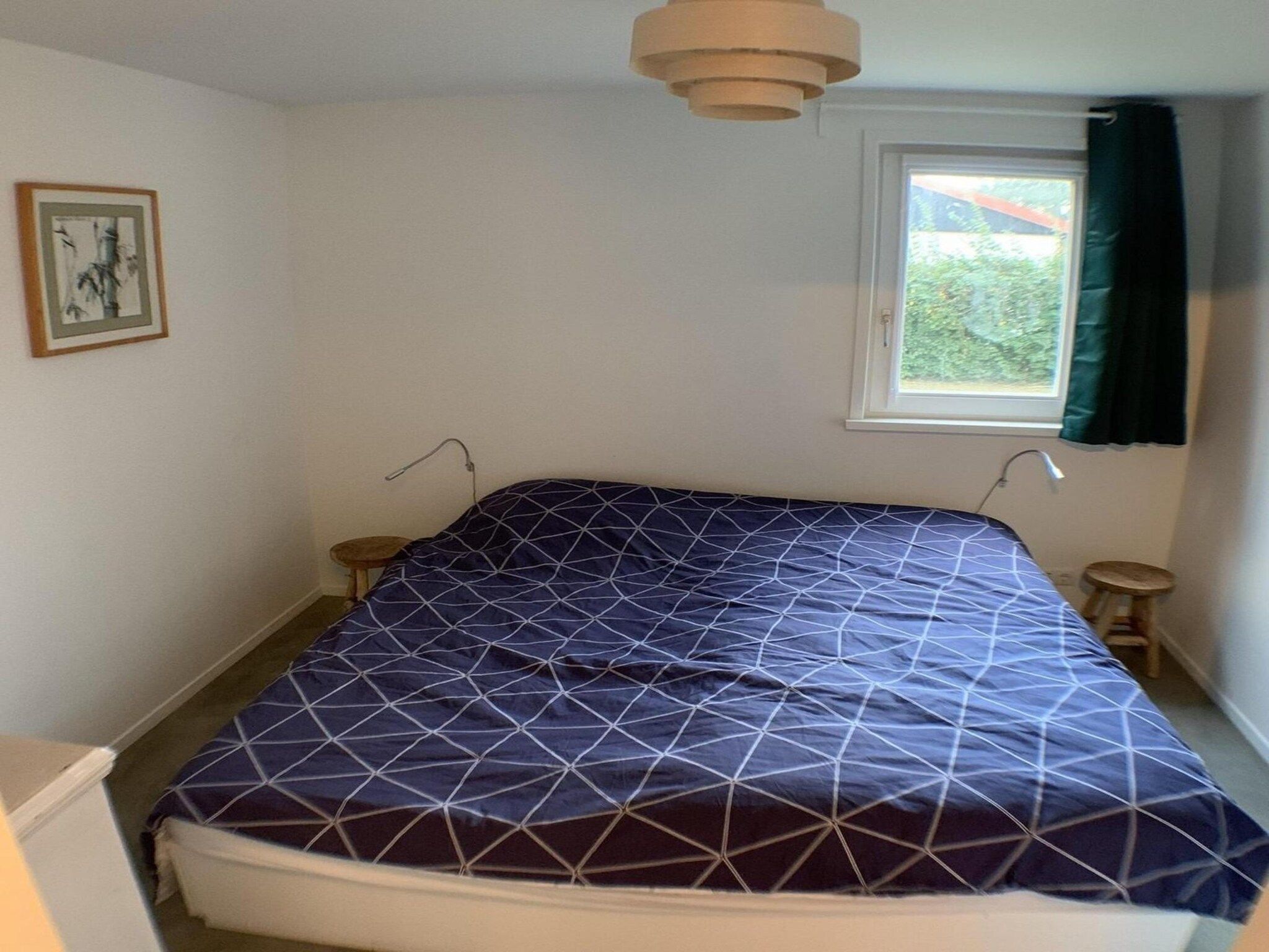 Een slaapkamer van Eb en Vloed 45 in Sint Maartenszee