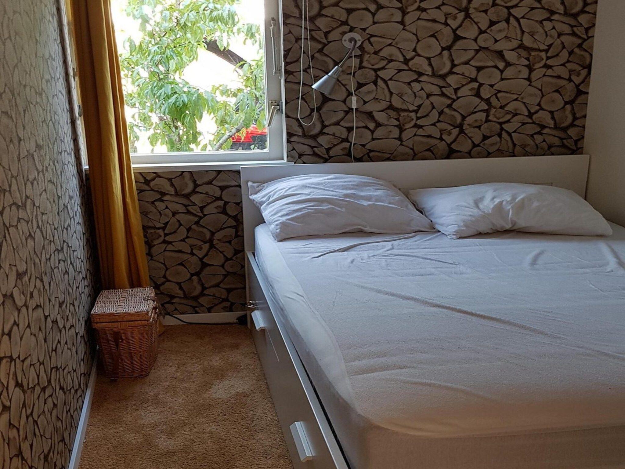 Een slaapkamer van Eb en Vloed 53 in Sint Maartenszee