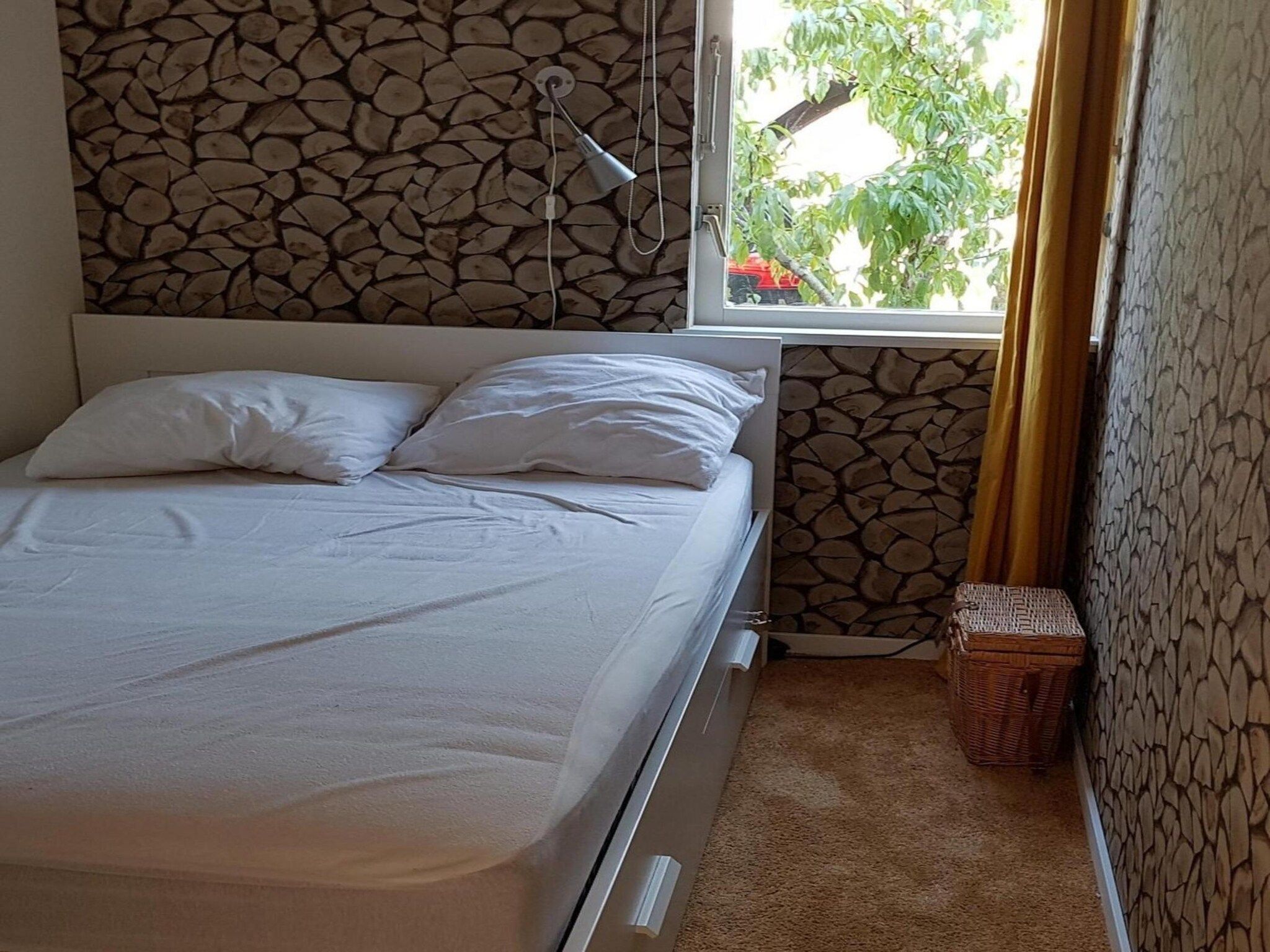 Een slaapkamer van Eb en Vloed 53 in Sint Maartenszee