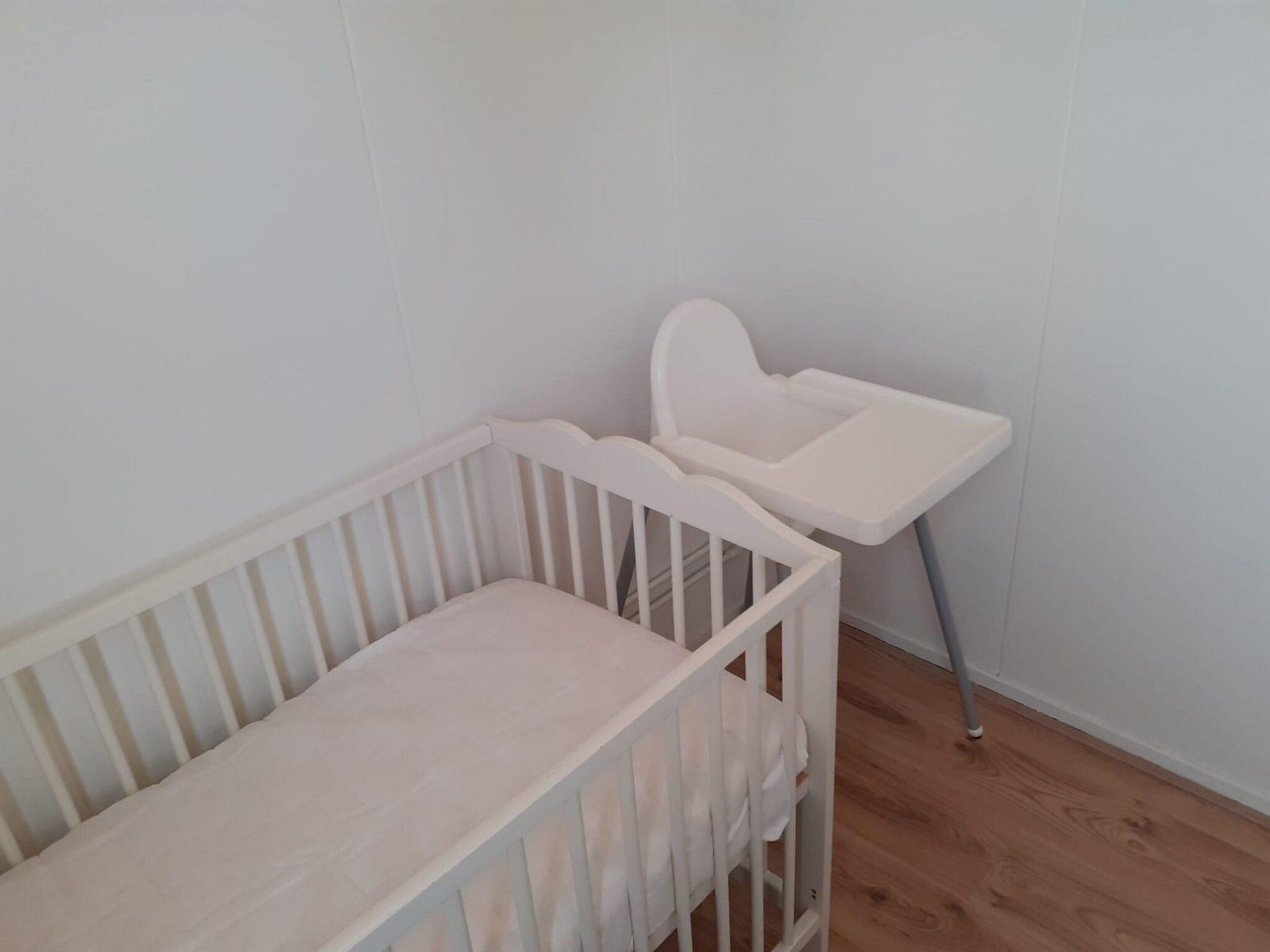 Een slaapkamer van Eb en Vloed 55 in Sint Maartenszee