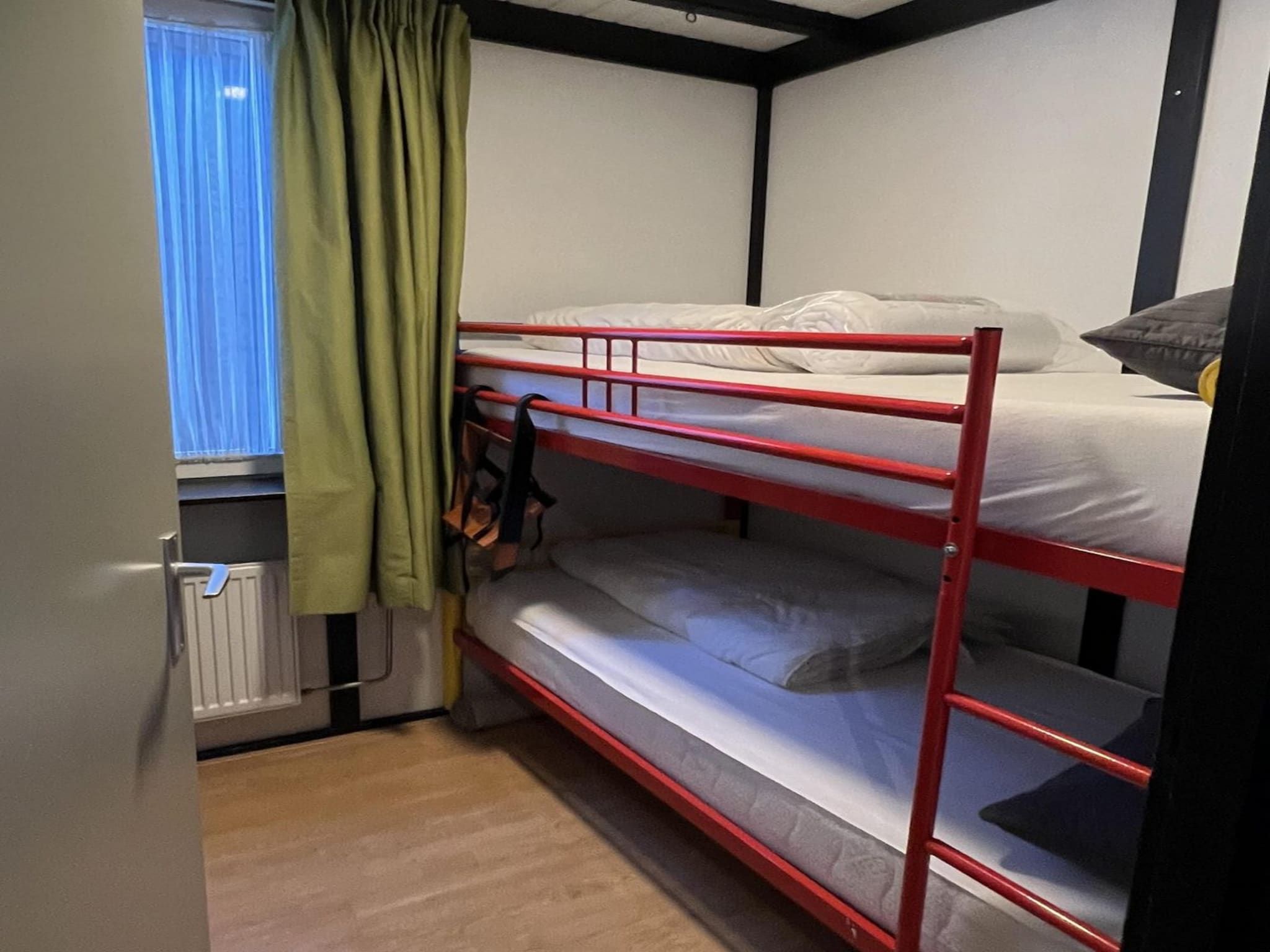 Een slaapkamer van Eb en Vloed 58 in Sint Maartenszee