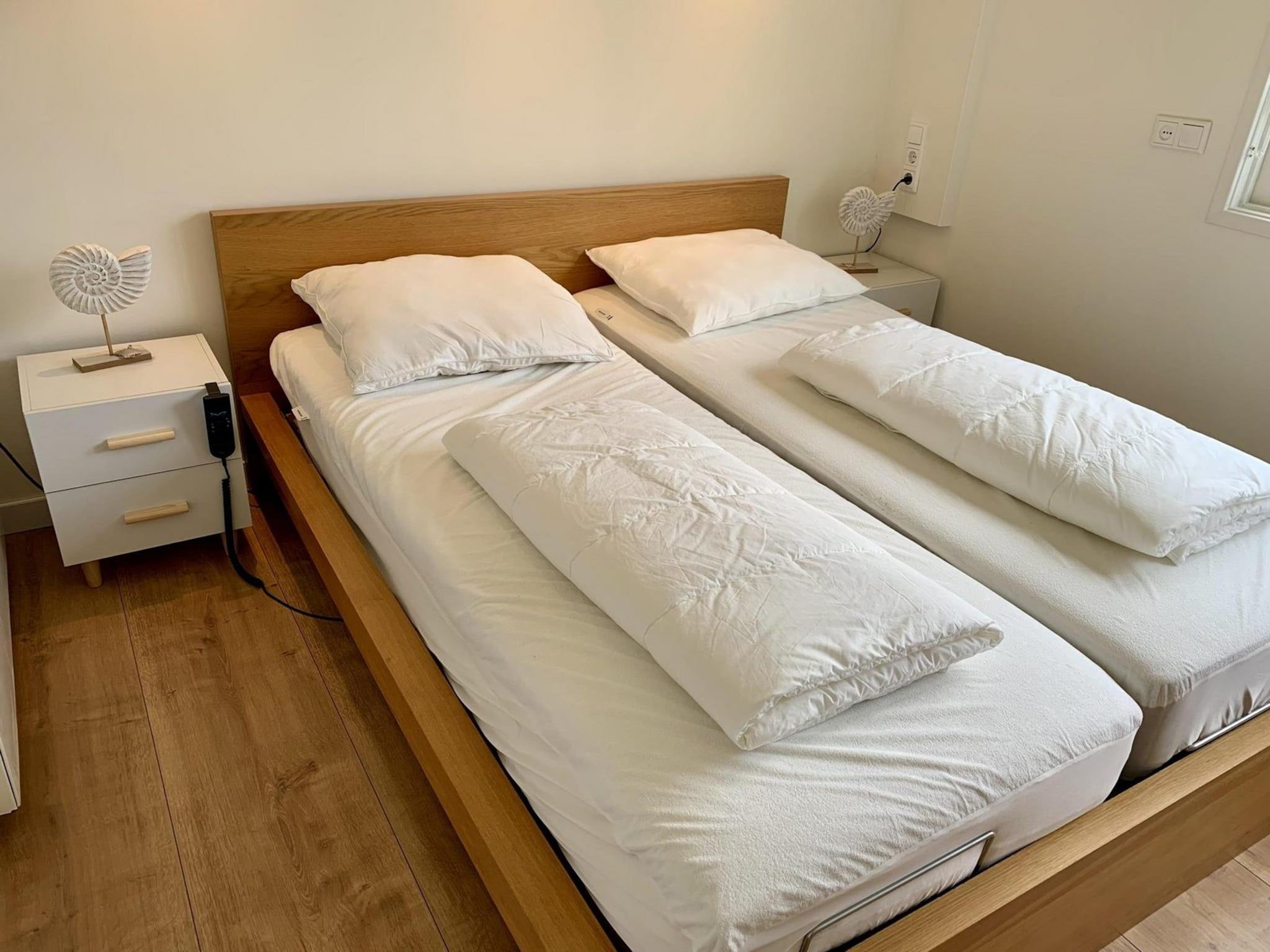 Een slaapkamer van Eb en Vloed 65 in Sint Maartenszee