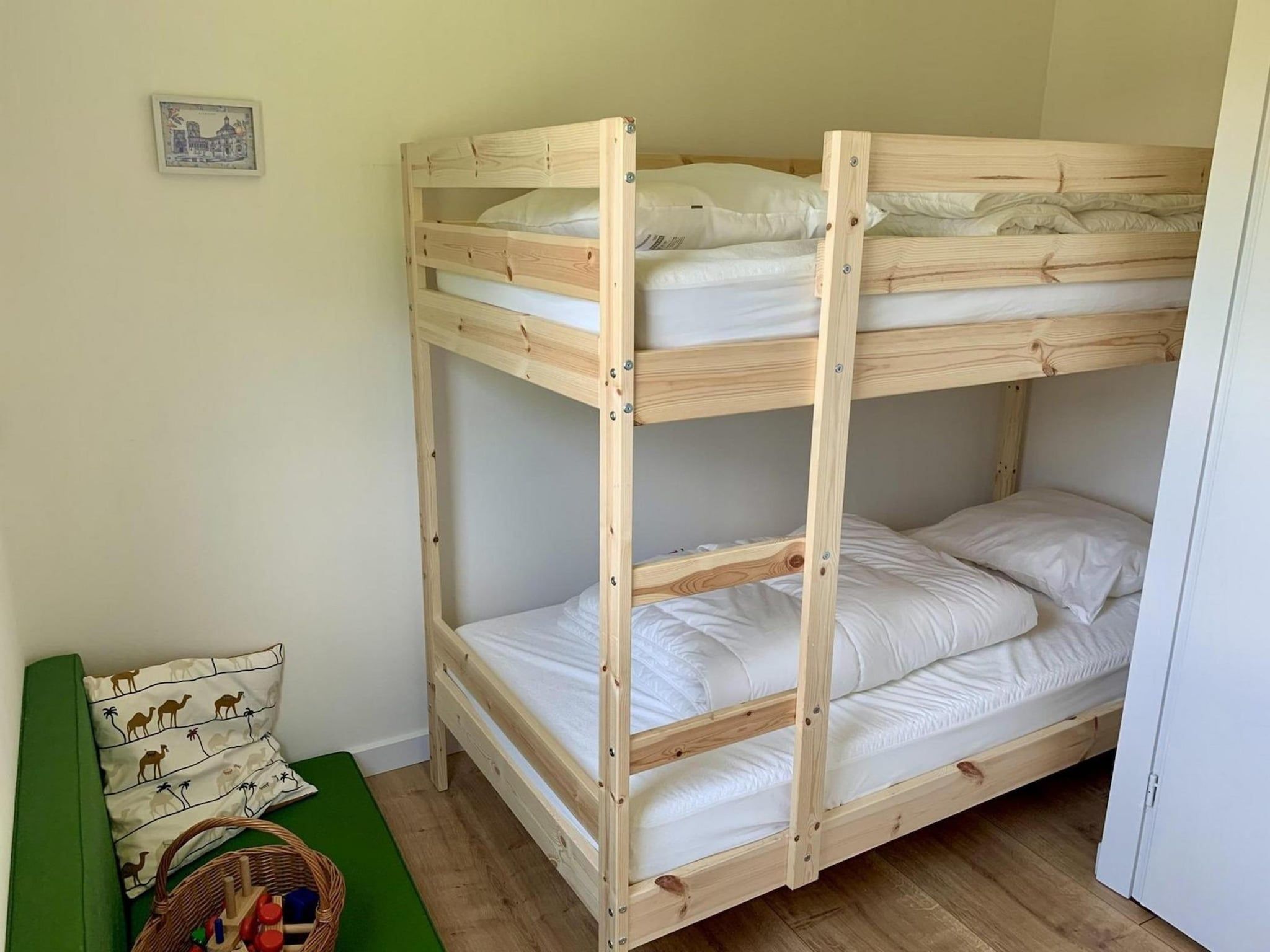 Een slaapkamer van Eb en Vloed 65 in Sint Maartenszee