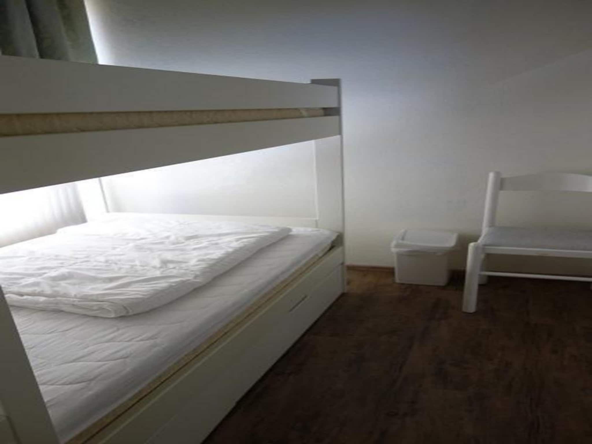 Een slaapkamer van Eureka 032 in Sint Maartenszee