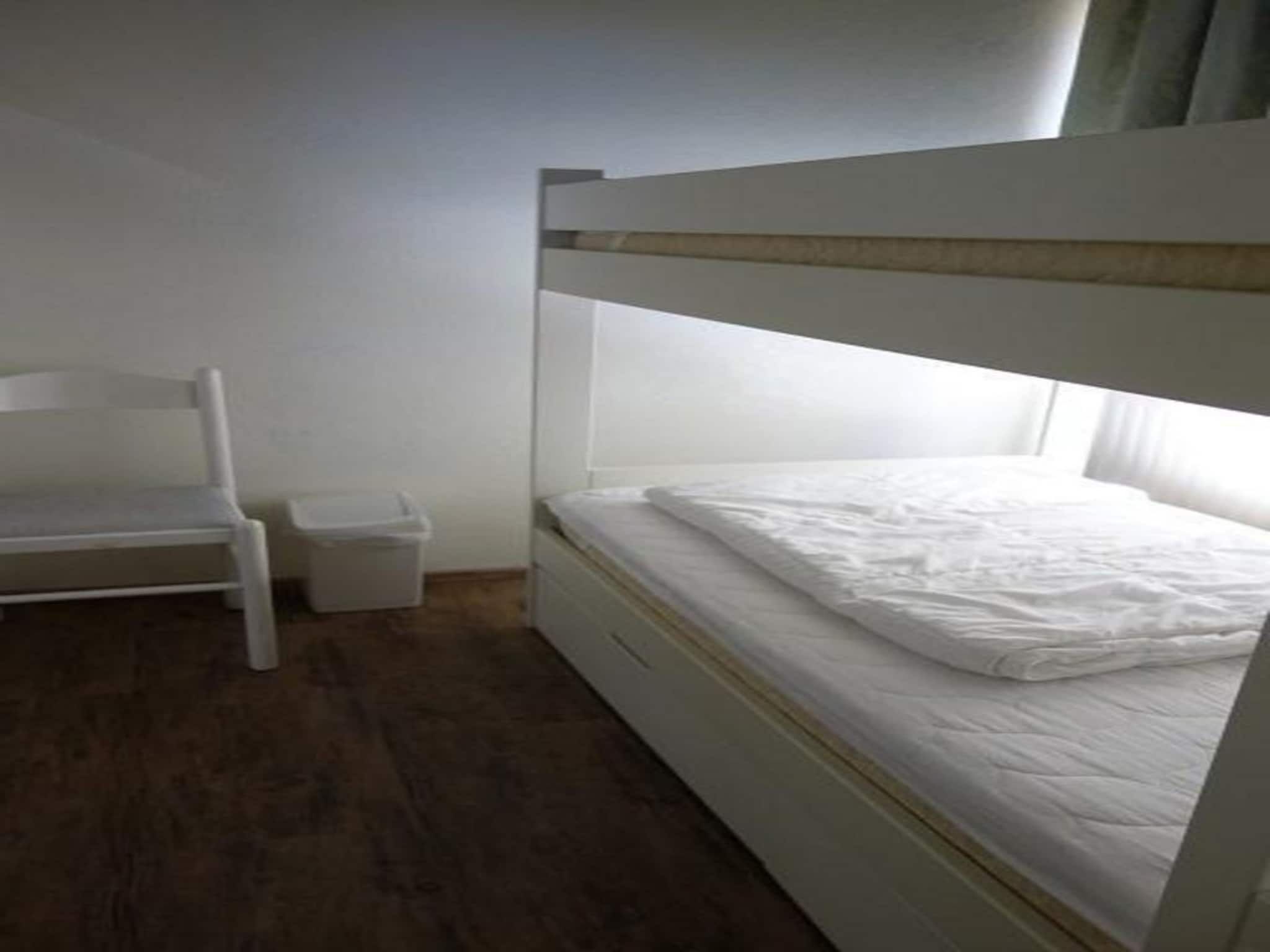 Een slaapkamer van Eureka 032 in Sint Maartenszee