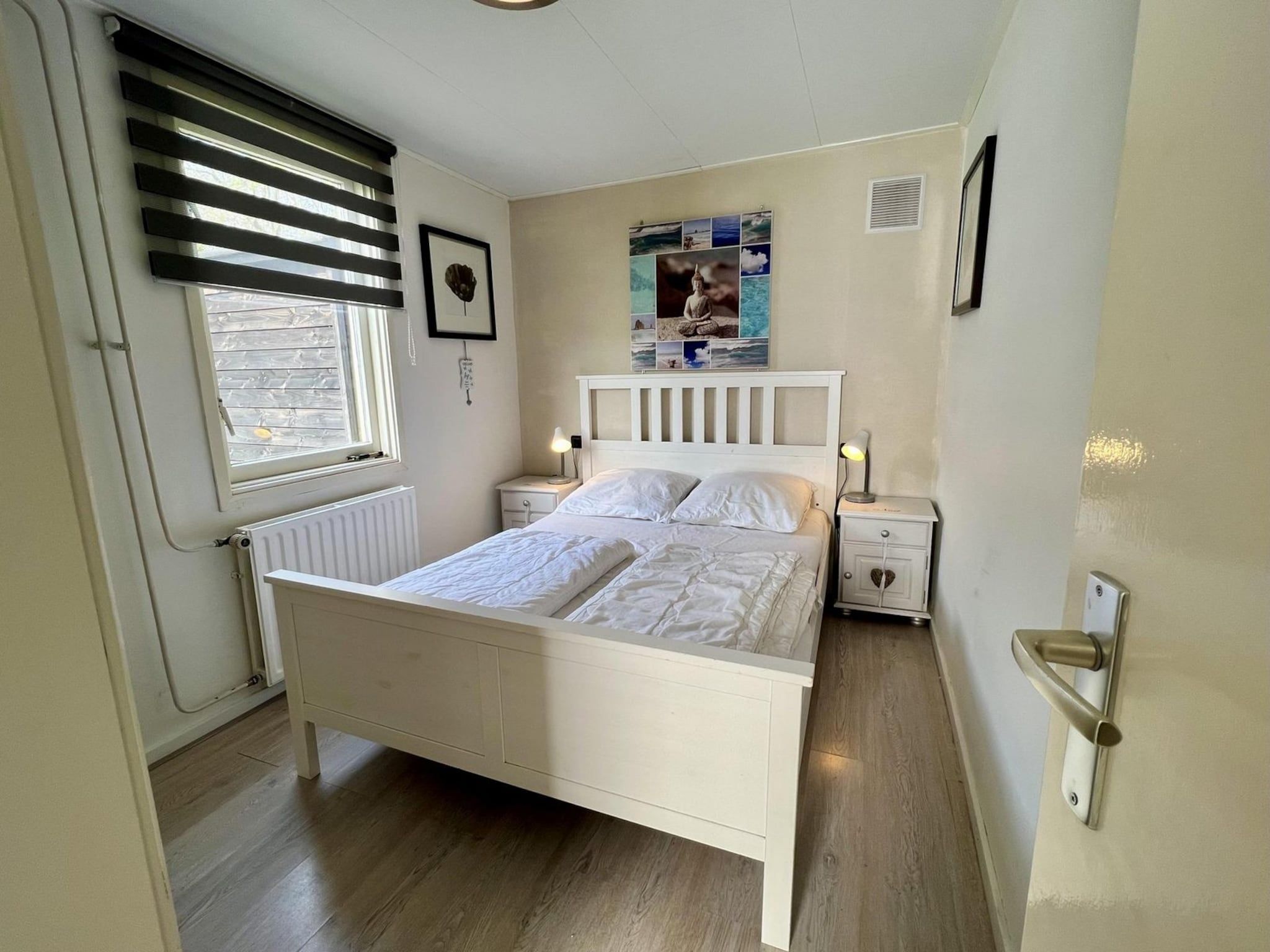 Een slaapkamer van Eb en Vloed 75 in Sint Maartenszee