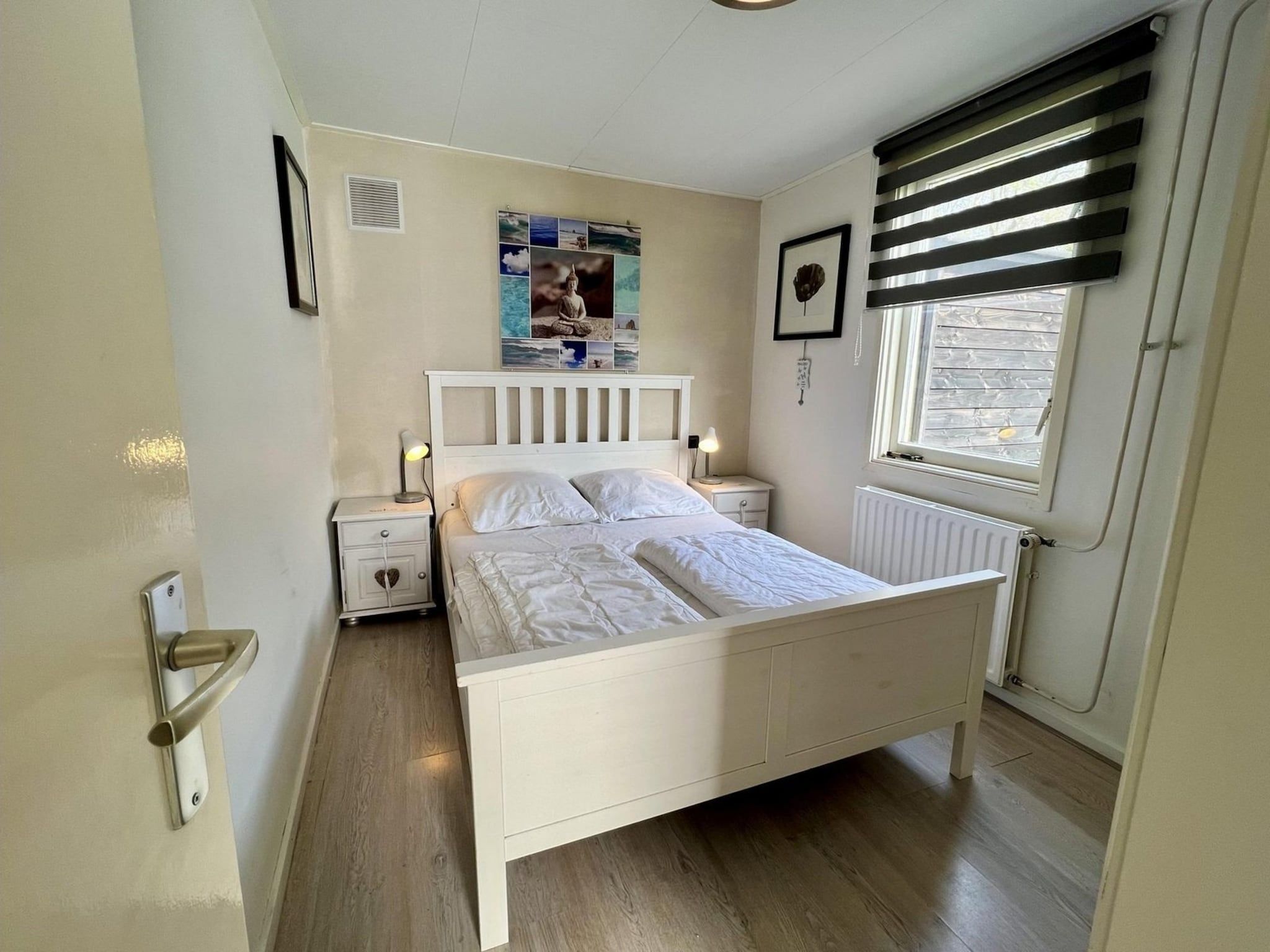 Een slaapkamer van Eb en Vloed 75 in Sint Maartenszee