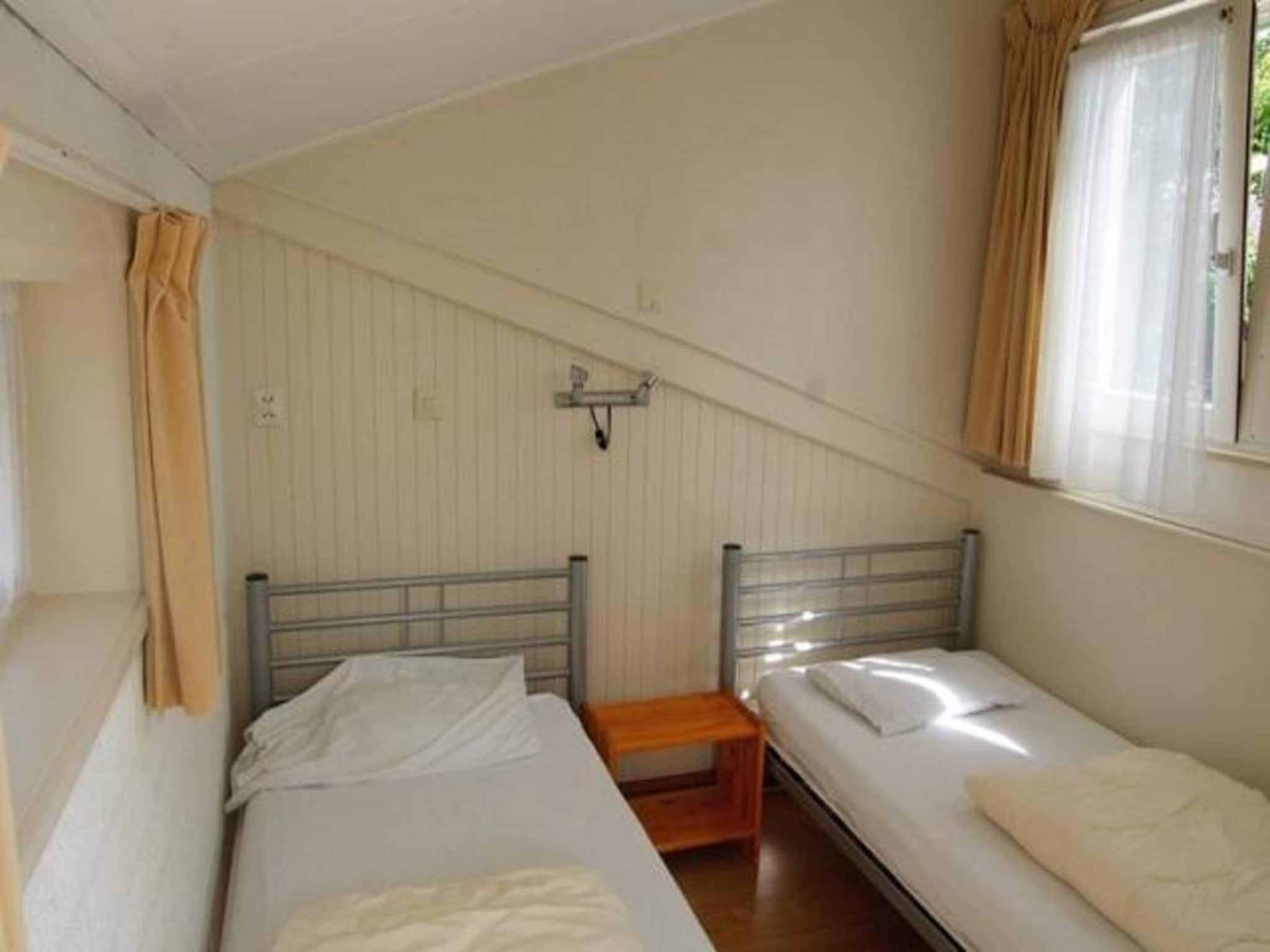 Een slaapkamer van Eriksstraat 8 in Petten