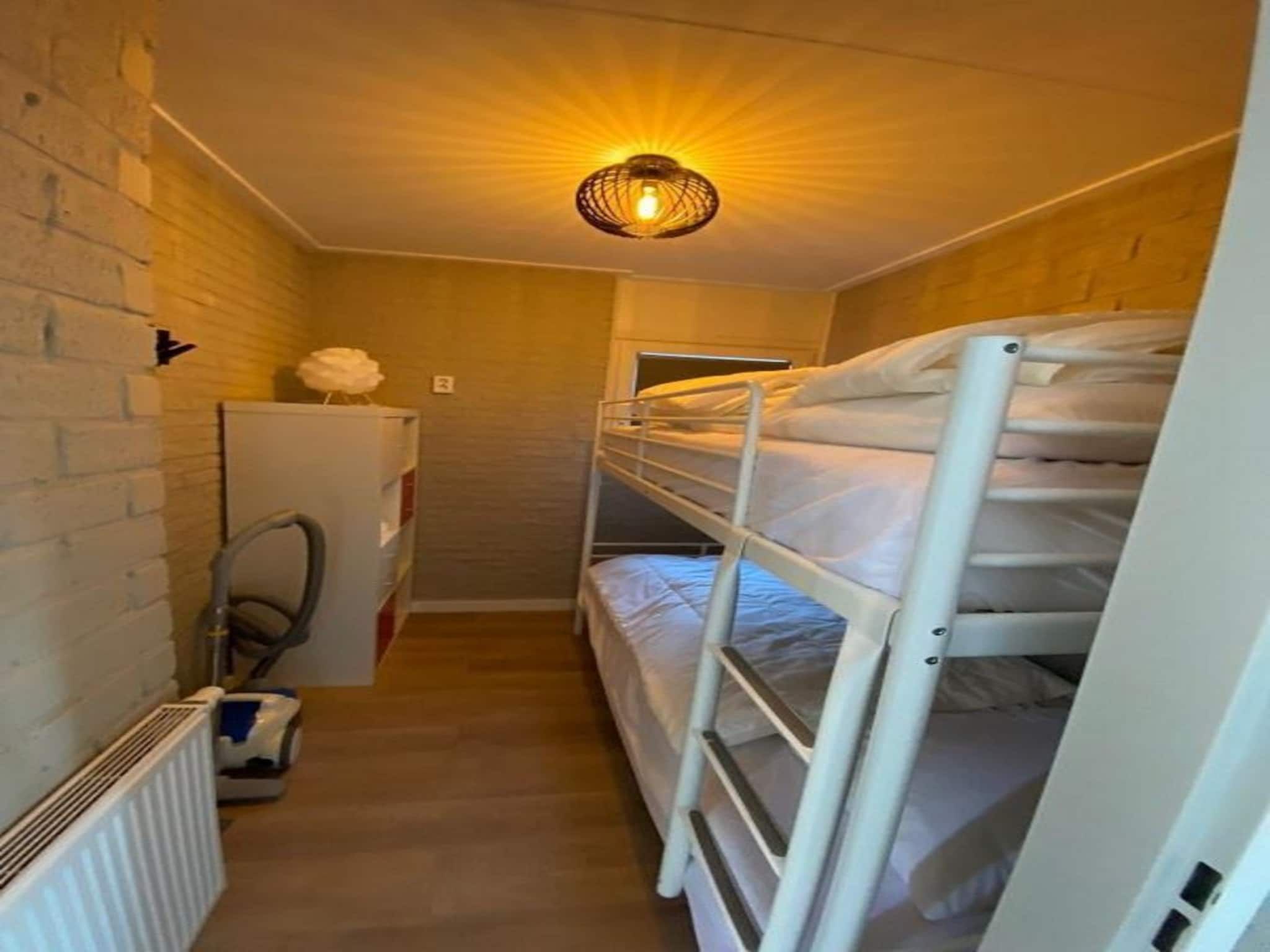 Een slaapkamer van Kloosterbos 4 in Sint Maartensbrug