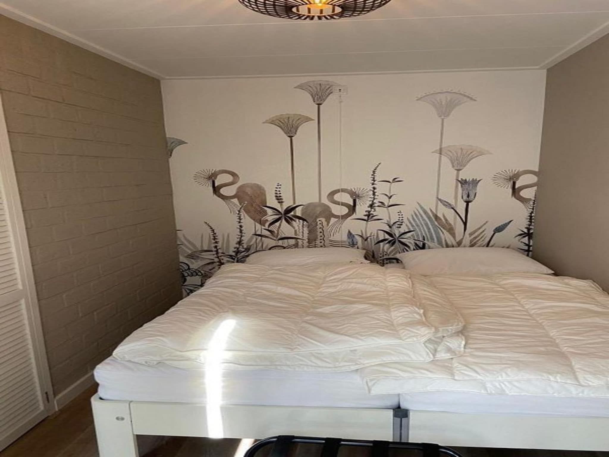 Een slaapkamer van Kloosterbos 4 in Sint Maartensbrug