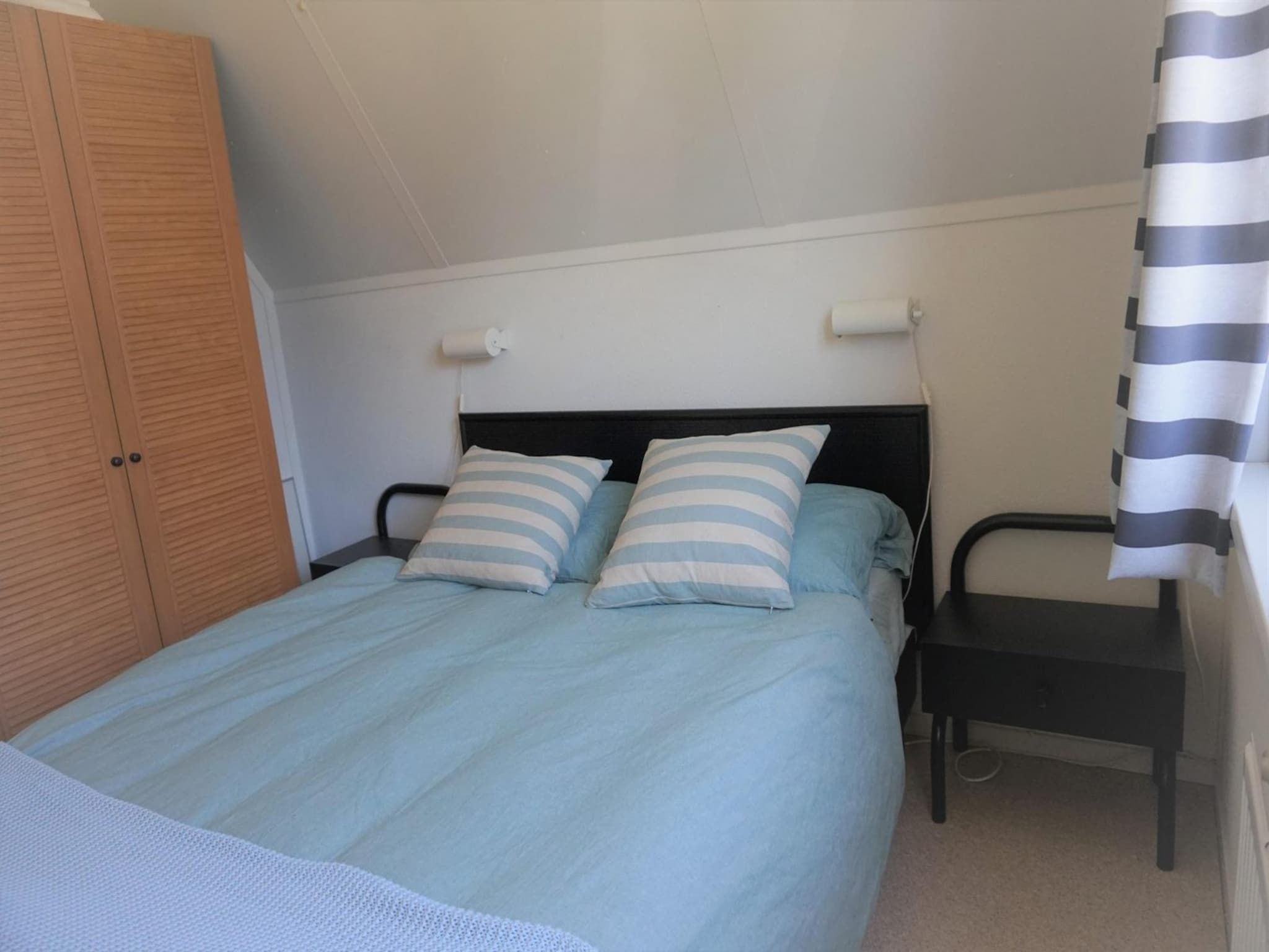 Een slaapkamer van Vogelvrij 4 in Burgerbrug