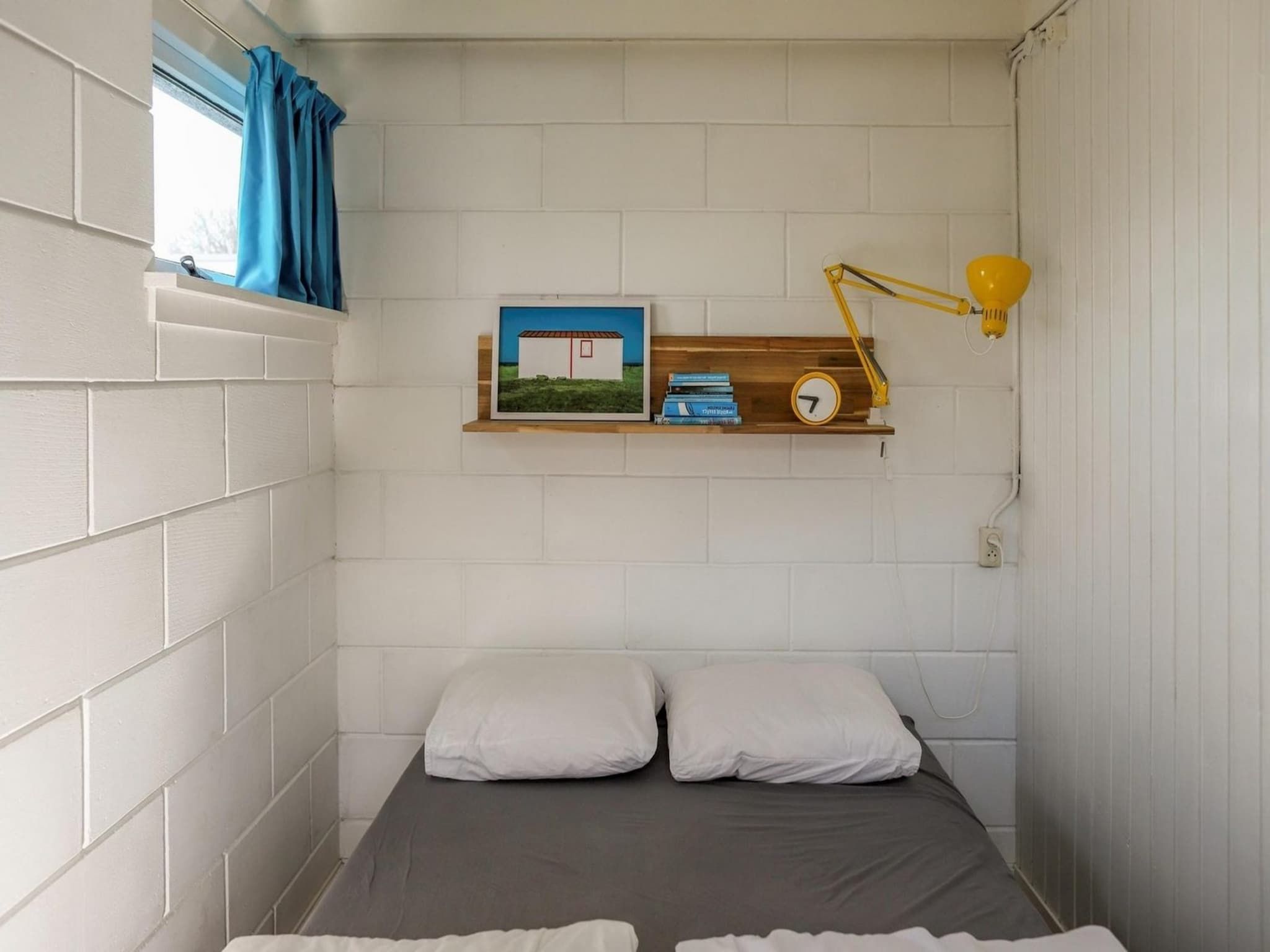 Een slaapkamer van Wildrijk 21 in Sint Maartenszee