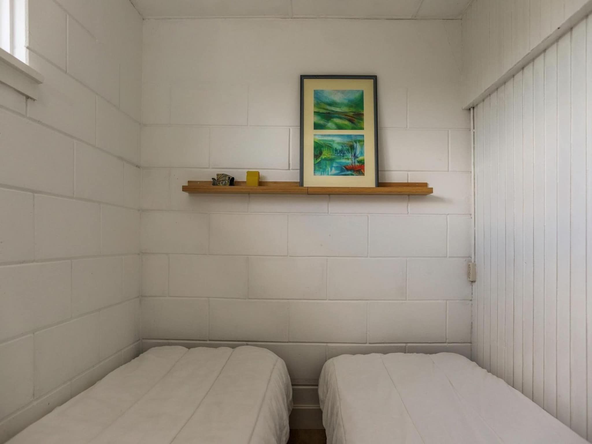 Een slaapkamer van Wildrijk 21 in Sint Maartenszee