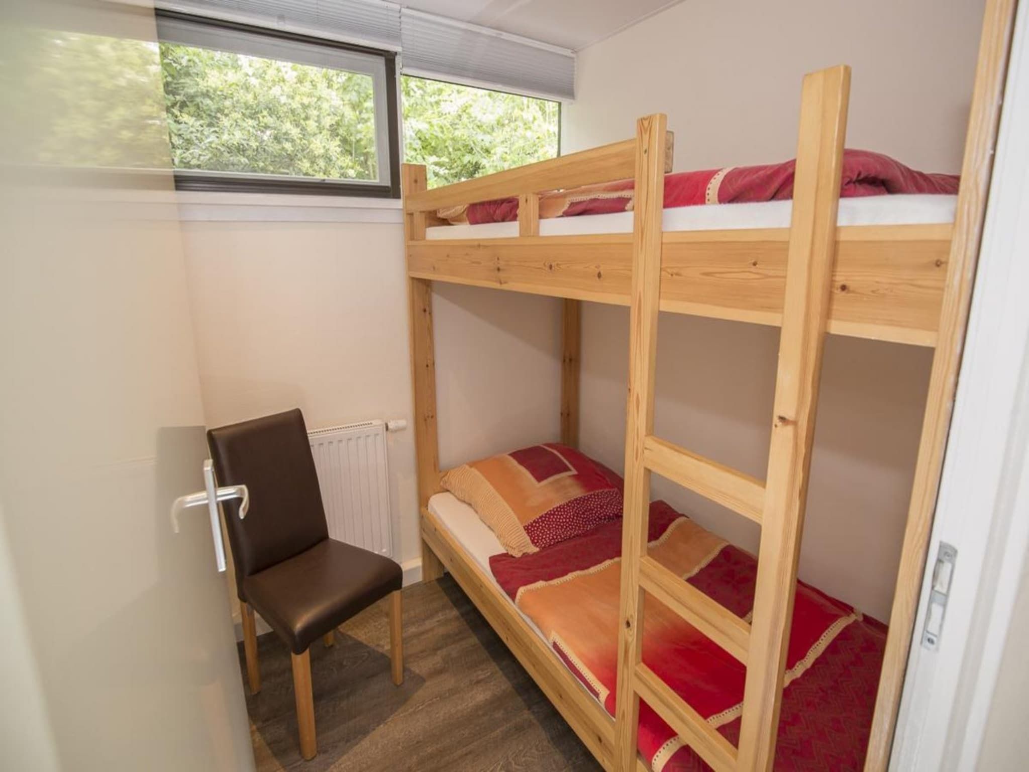 Een slaapkamer van Wildrijk 035 in Sint Maartenszee