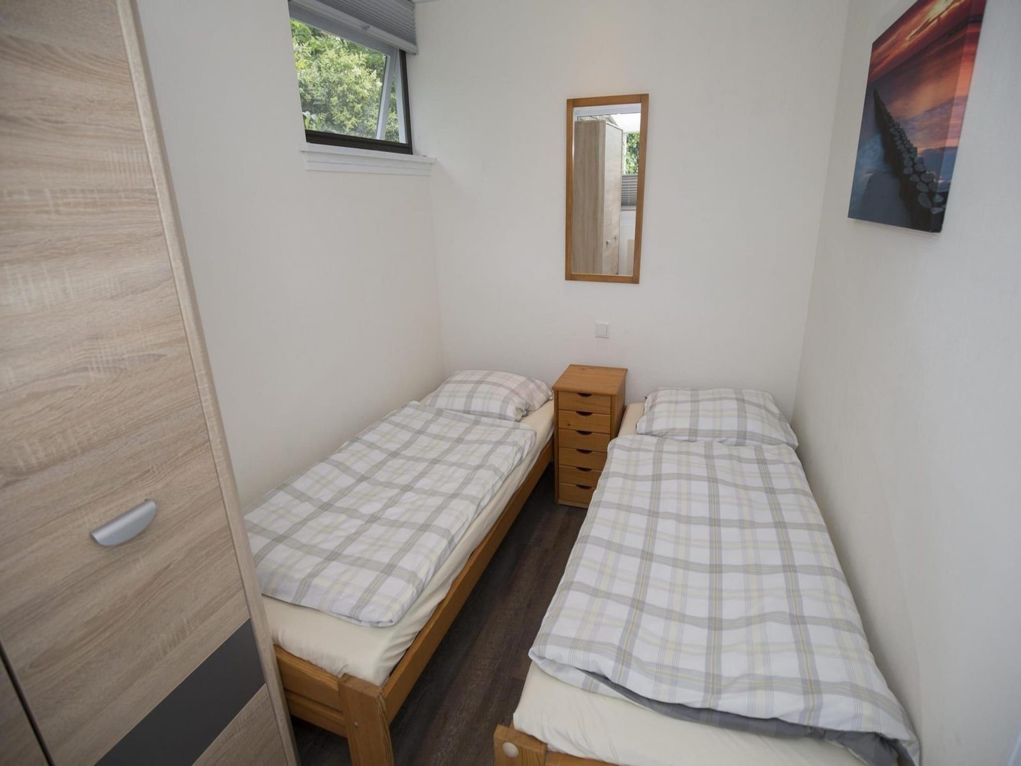 Een slaapkamer van Wildrijk 035 in Sint Maartenszee