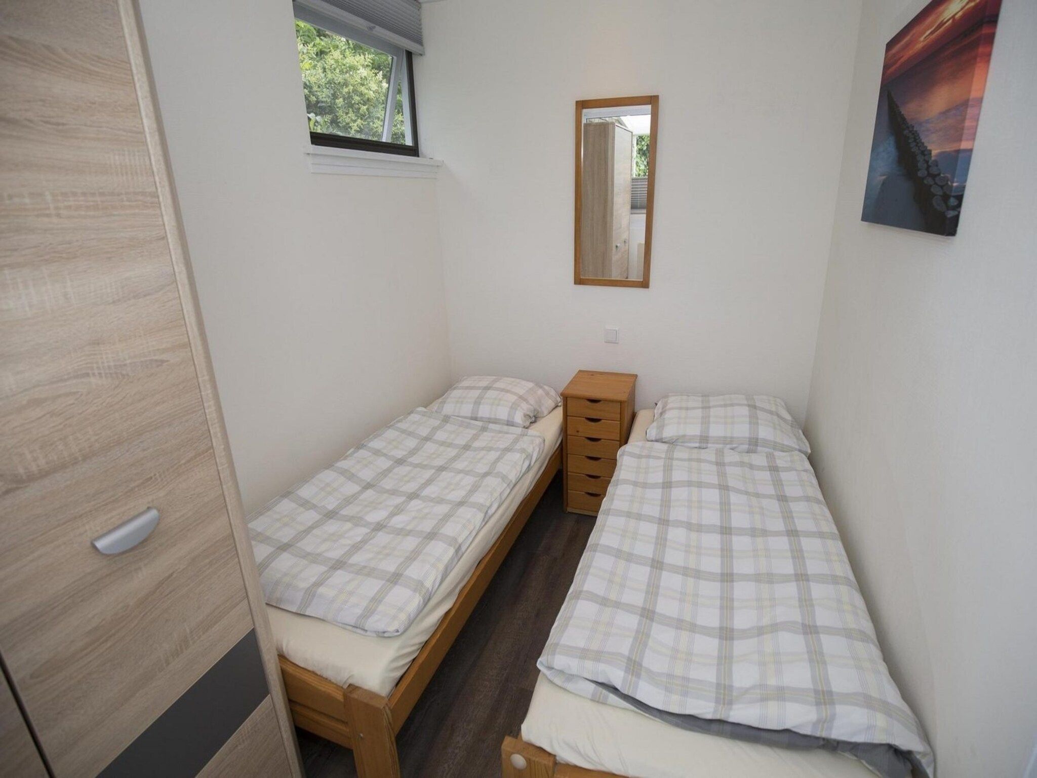 Een slaapkamer van Wildrijk 035 in Sint Maartenszee