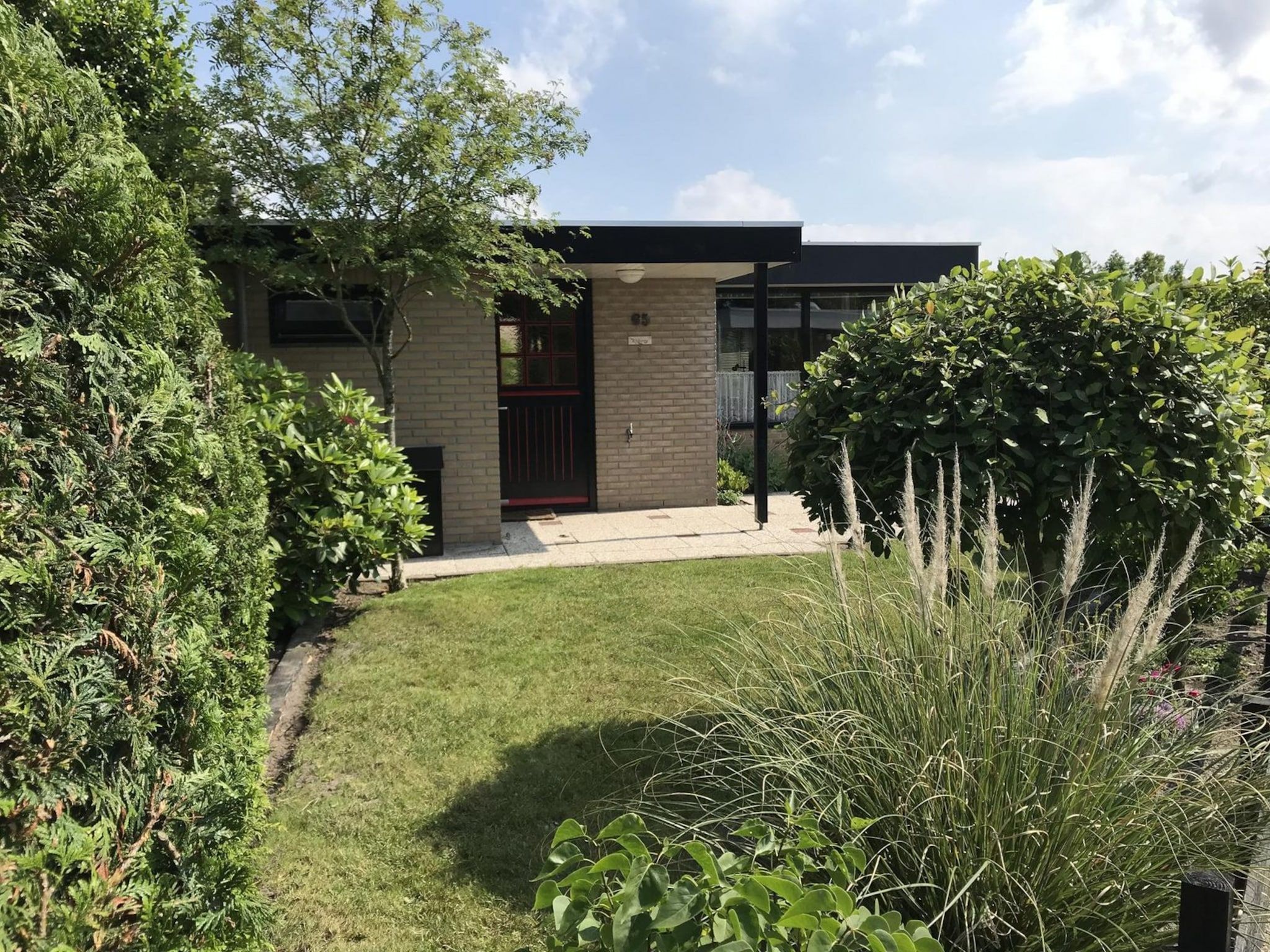 De tuin van Wildrijk 065 in Sint Maartenszee