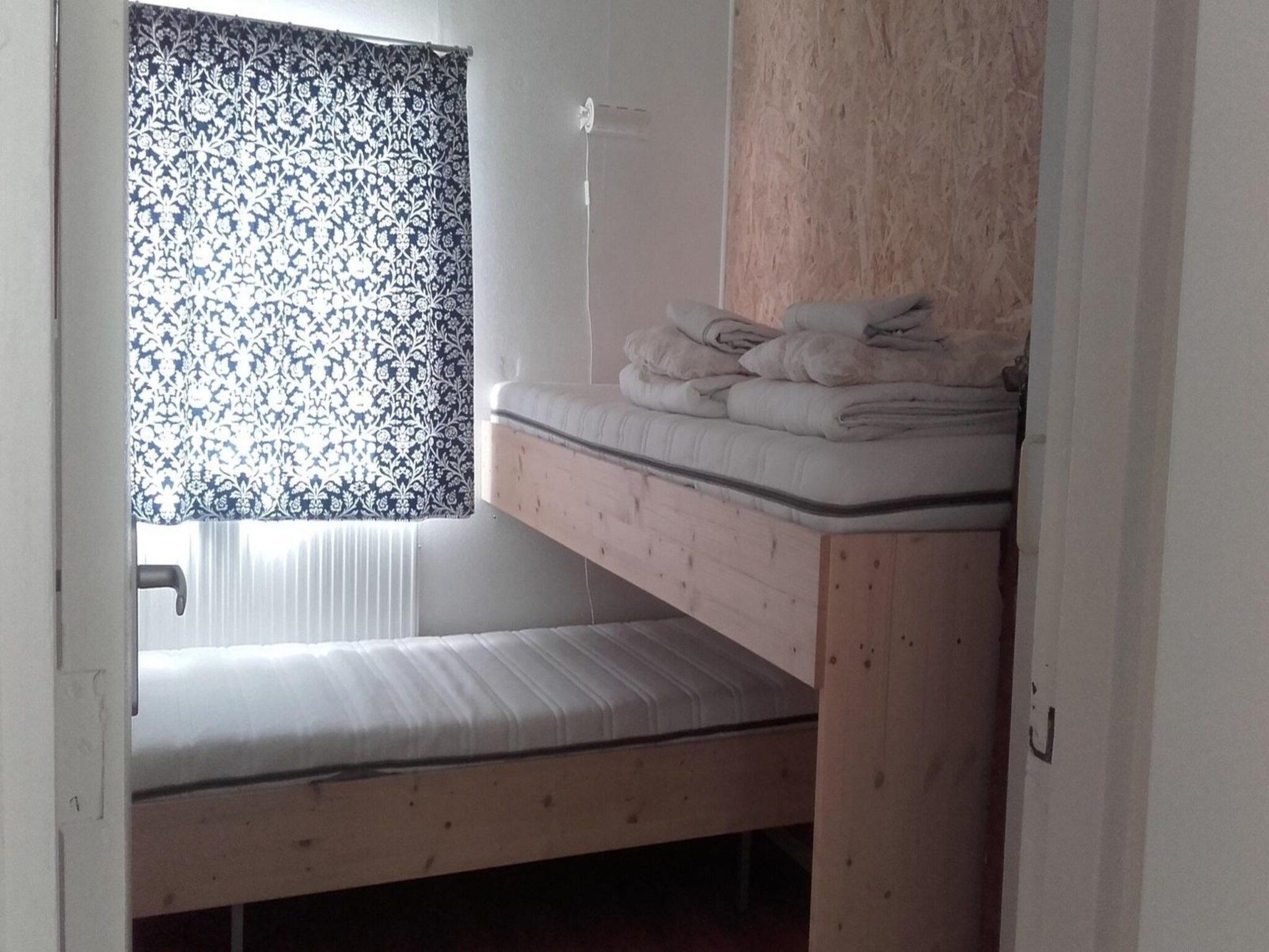 Een slaapkamer van Zeewaard 5 in Sint Maartenszee