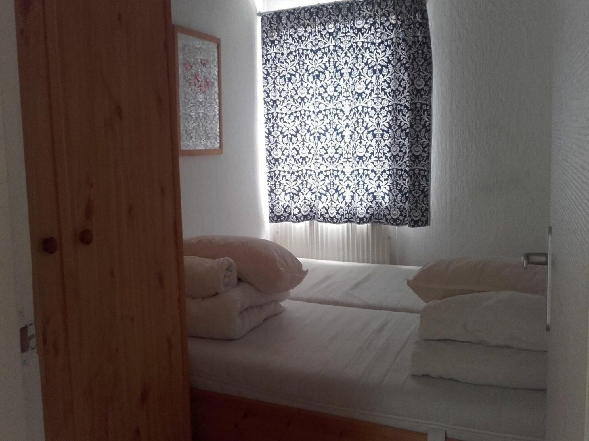 Een slaapkamer van Zeewaard 5 in Sint Maartenszee