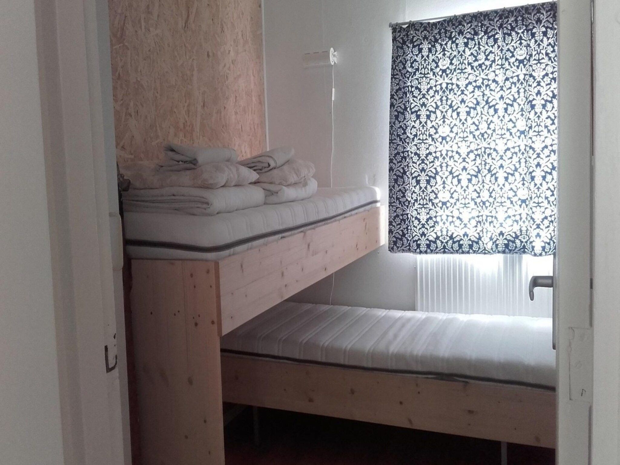 Een slaapkamer van Zeewaard 5 in Sint Maartenszee