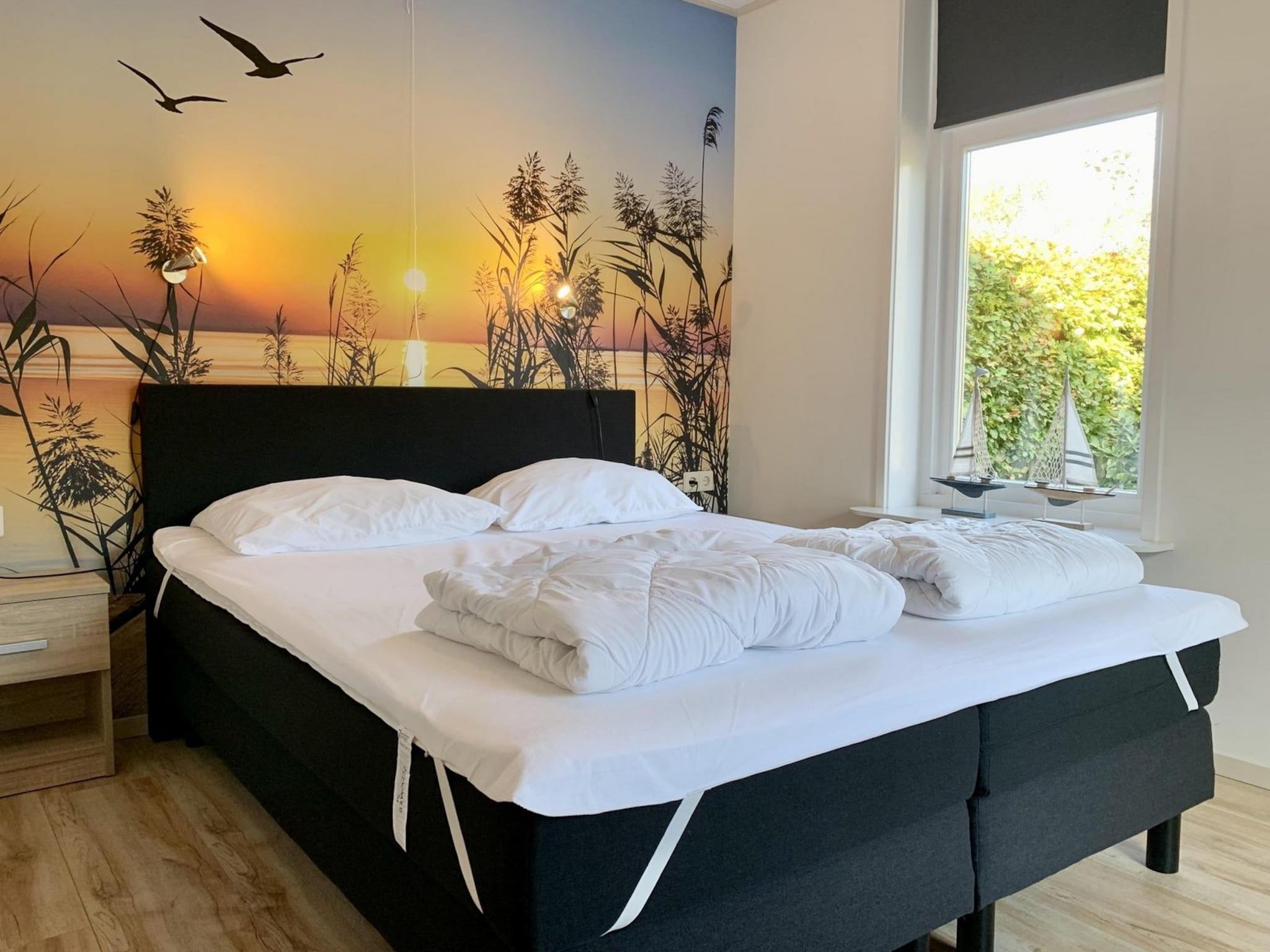 Een slaapkamer van Zeewaard 14 in Sint Maartenszee