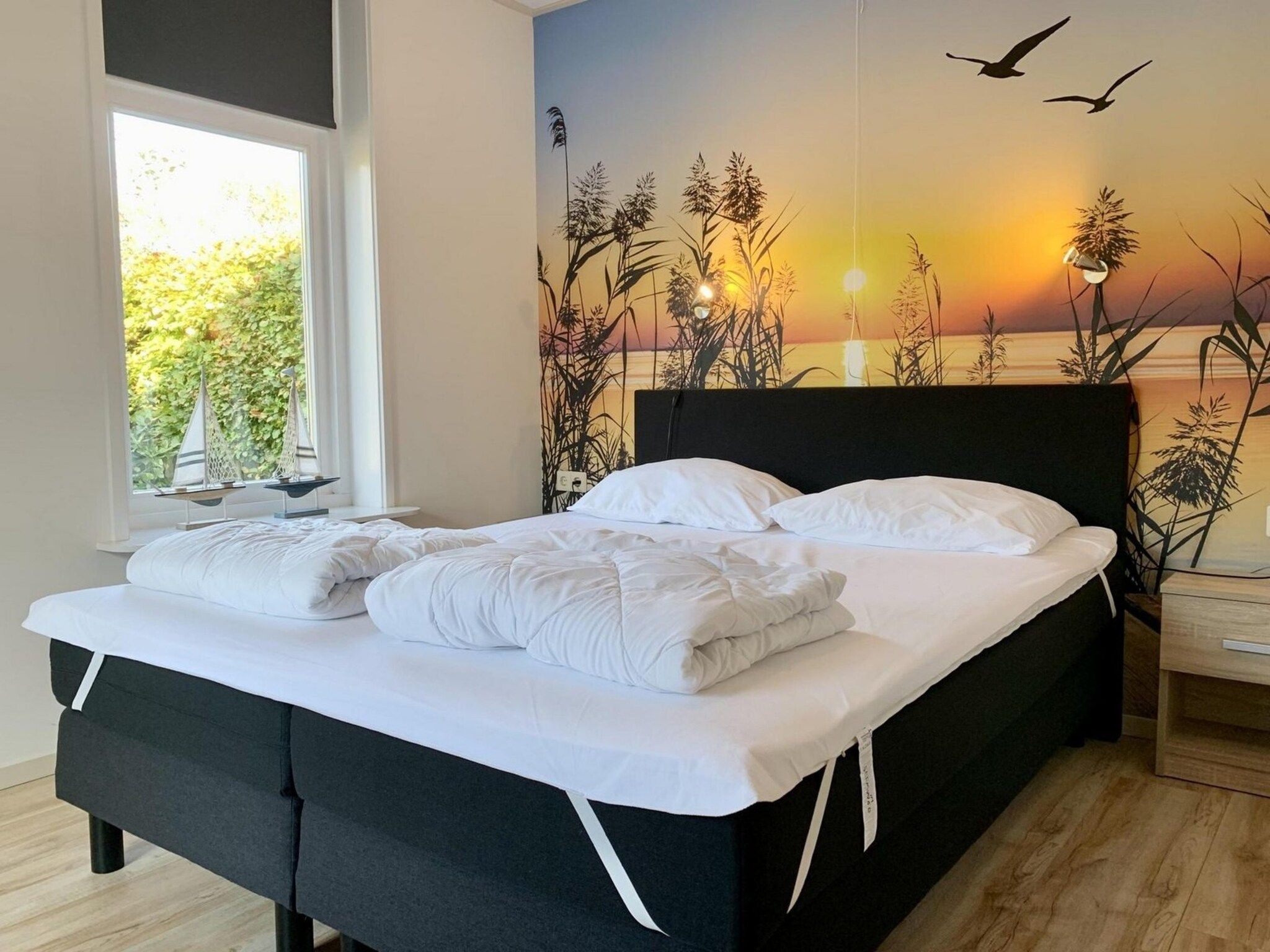 Een slaapkamer van Zeewaard 14 in Sint Maartenszee