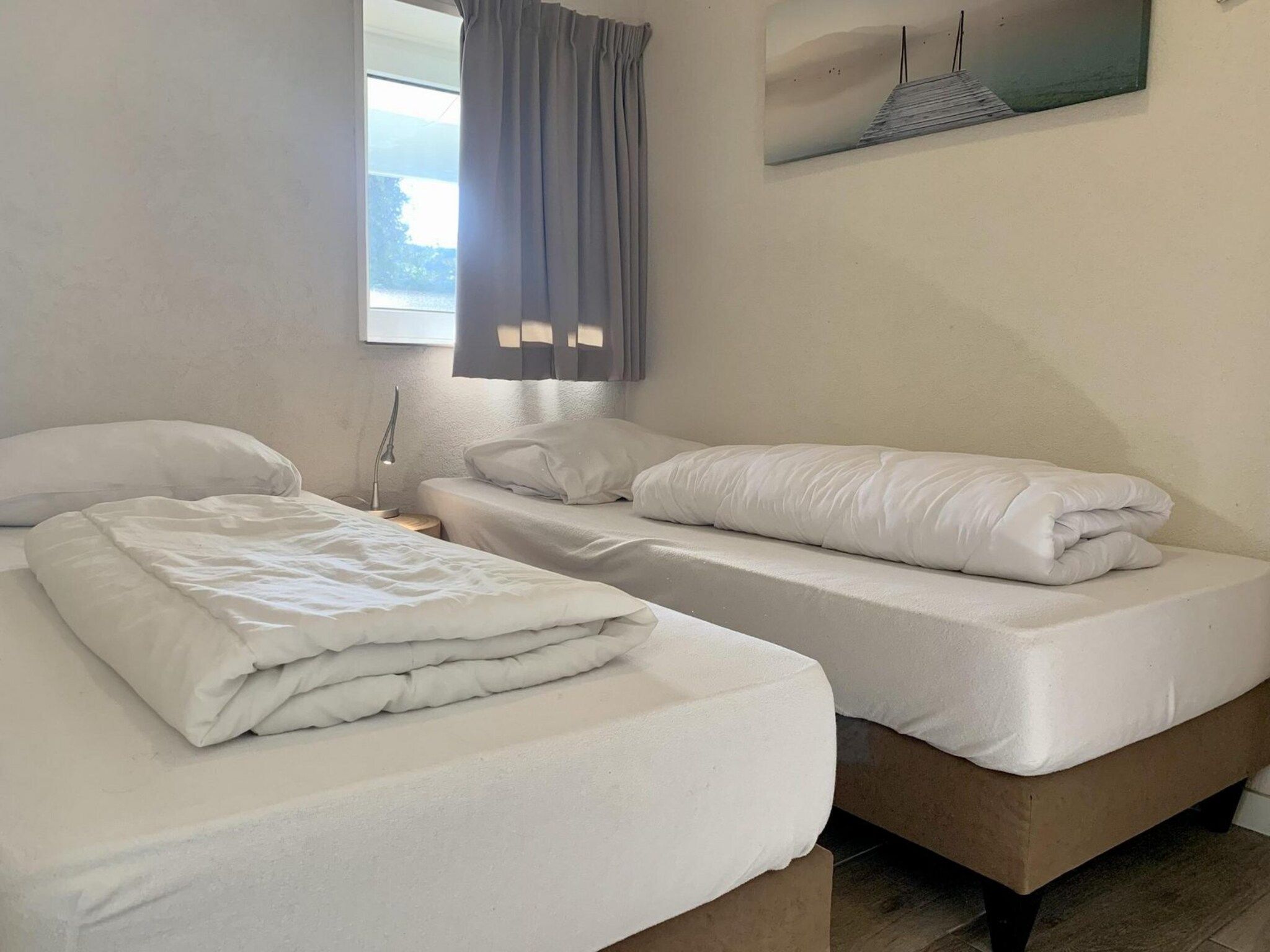 Een slaapkamer van Zeewaard 18 in Sint Maartenszee