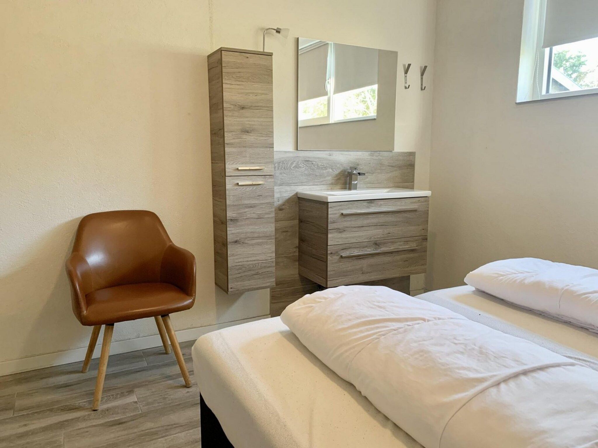 Een slaapkamer van Zeewaard 18 in Sint Maartenszee