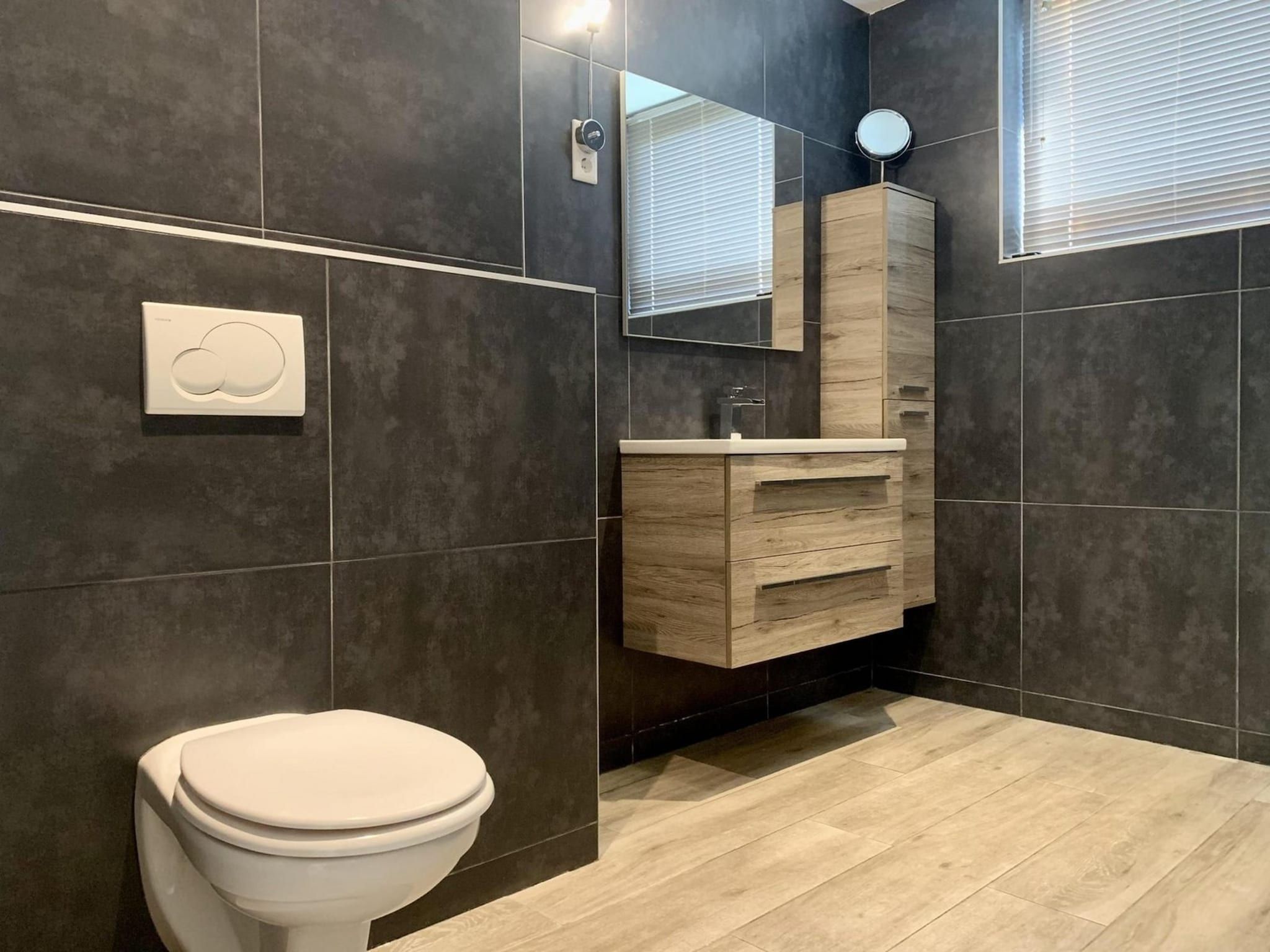 Een slaapkamer van Zeewaard 18 in Sint Maartenszee