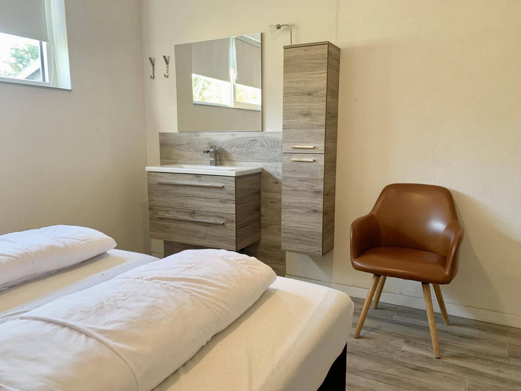 Een slaapkamer van Zeewaard 18 in Sint Maartenszee