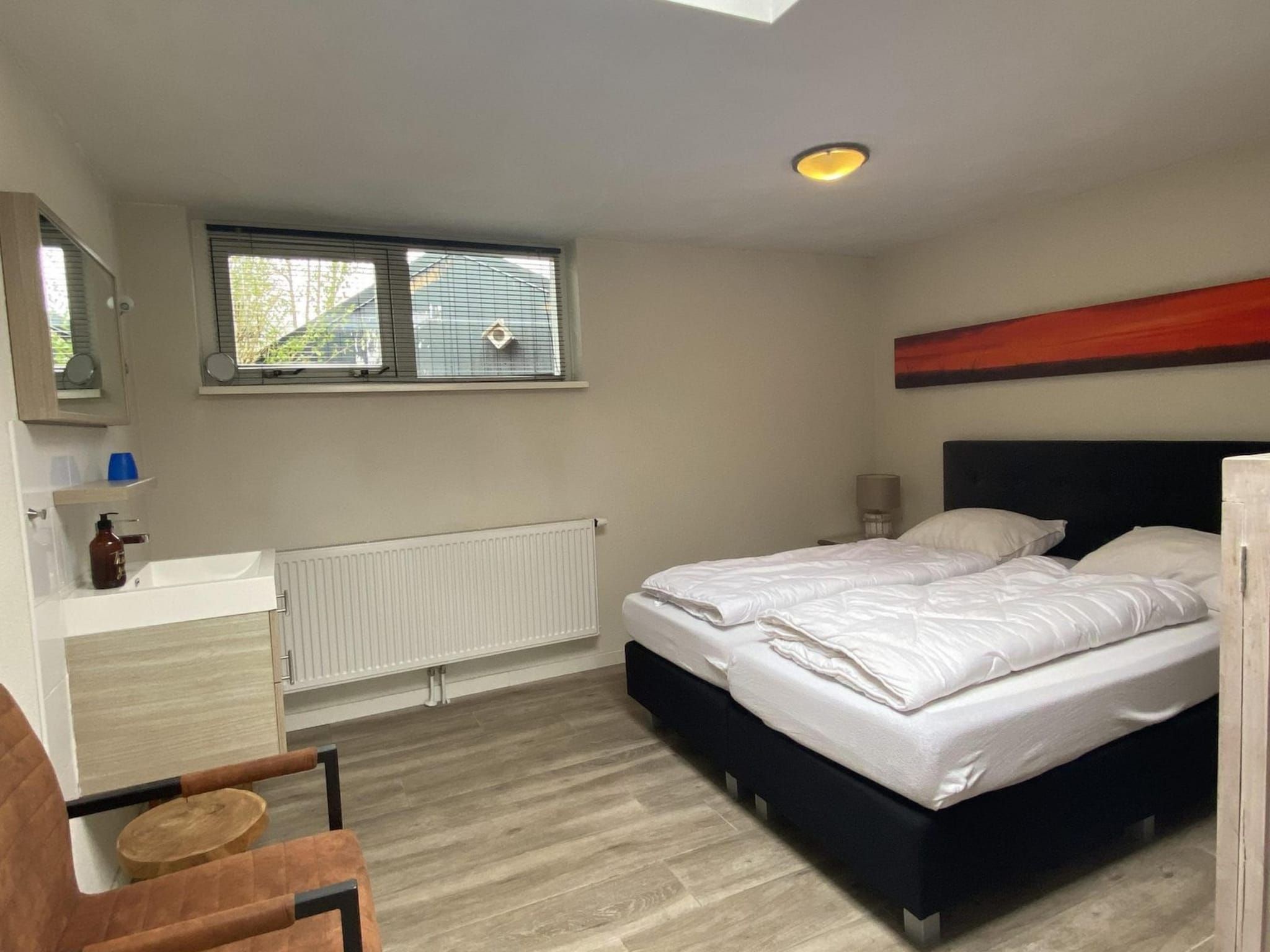 Een slaapkamer van Zeewaard 37 in Sint Maartenszee