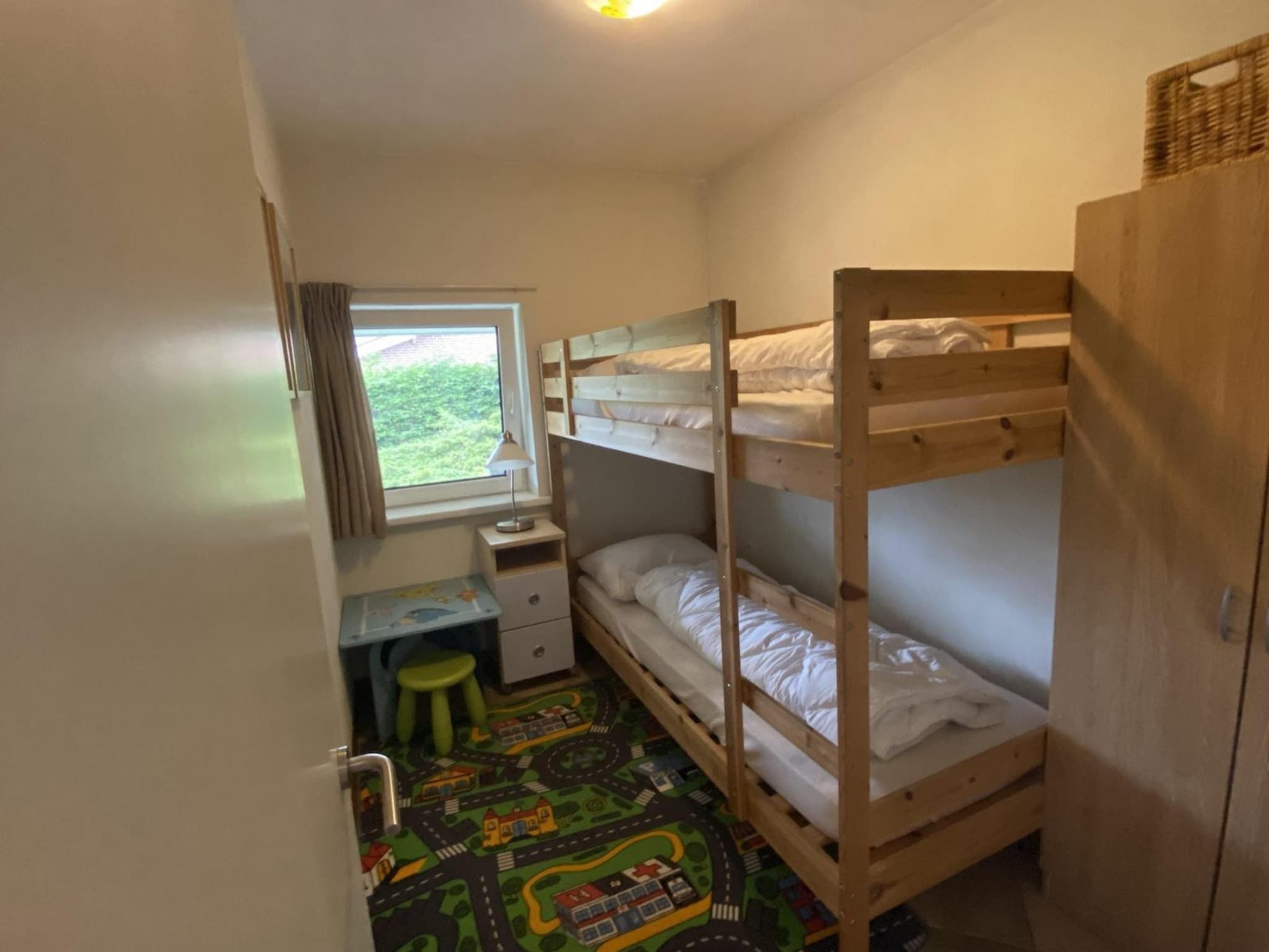 Een slaapkamer van Zeewaard 37 in Sint Maartenszee