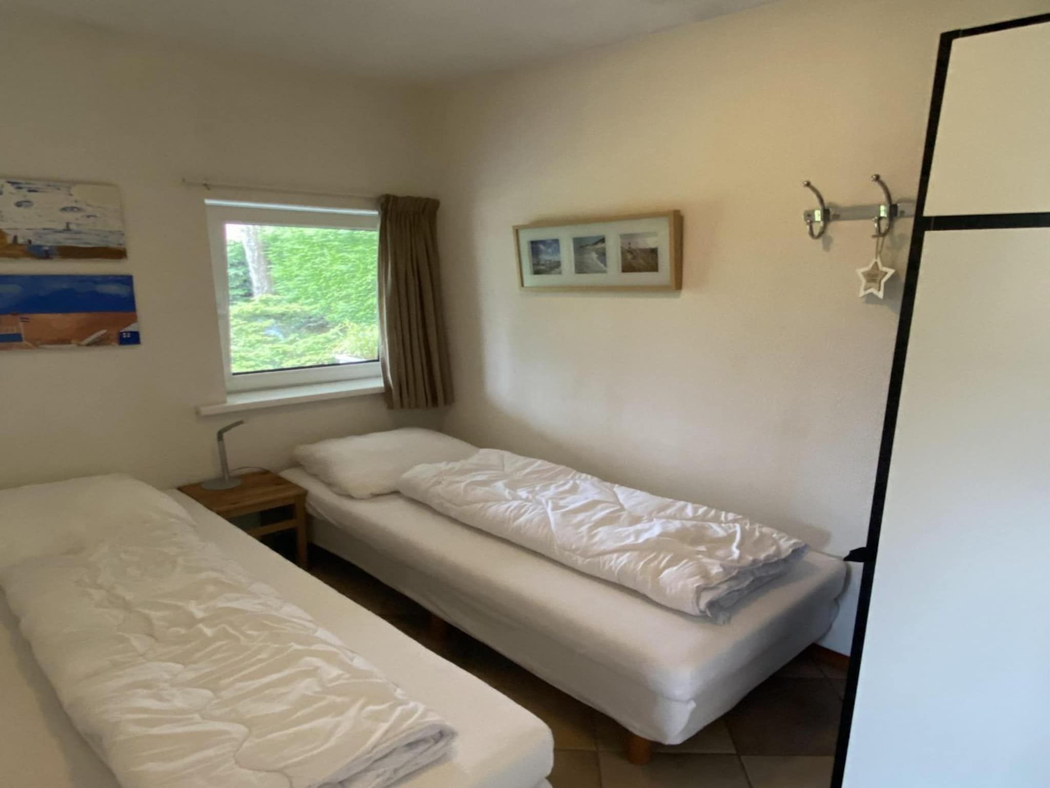 Een slaapkamer van Zeewaard 37 in Sint Maartenszee