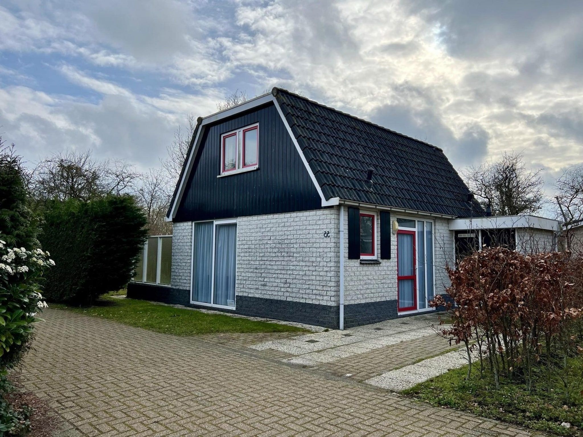 De woonkamer van Campanula 55 in Sint Maartenszee