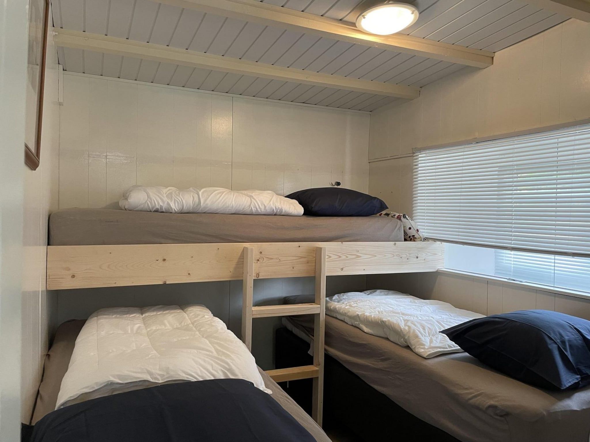 Een slaapkamer van Campanula 173 in Sint Maartenszee
