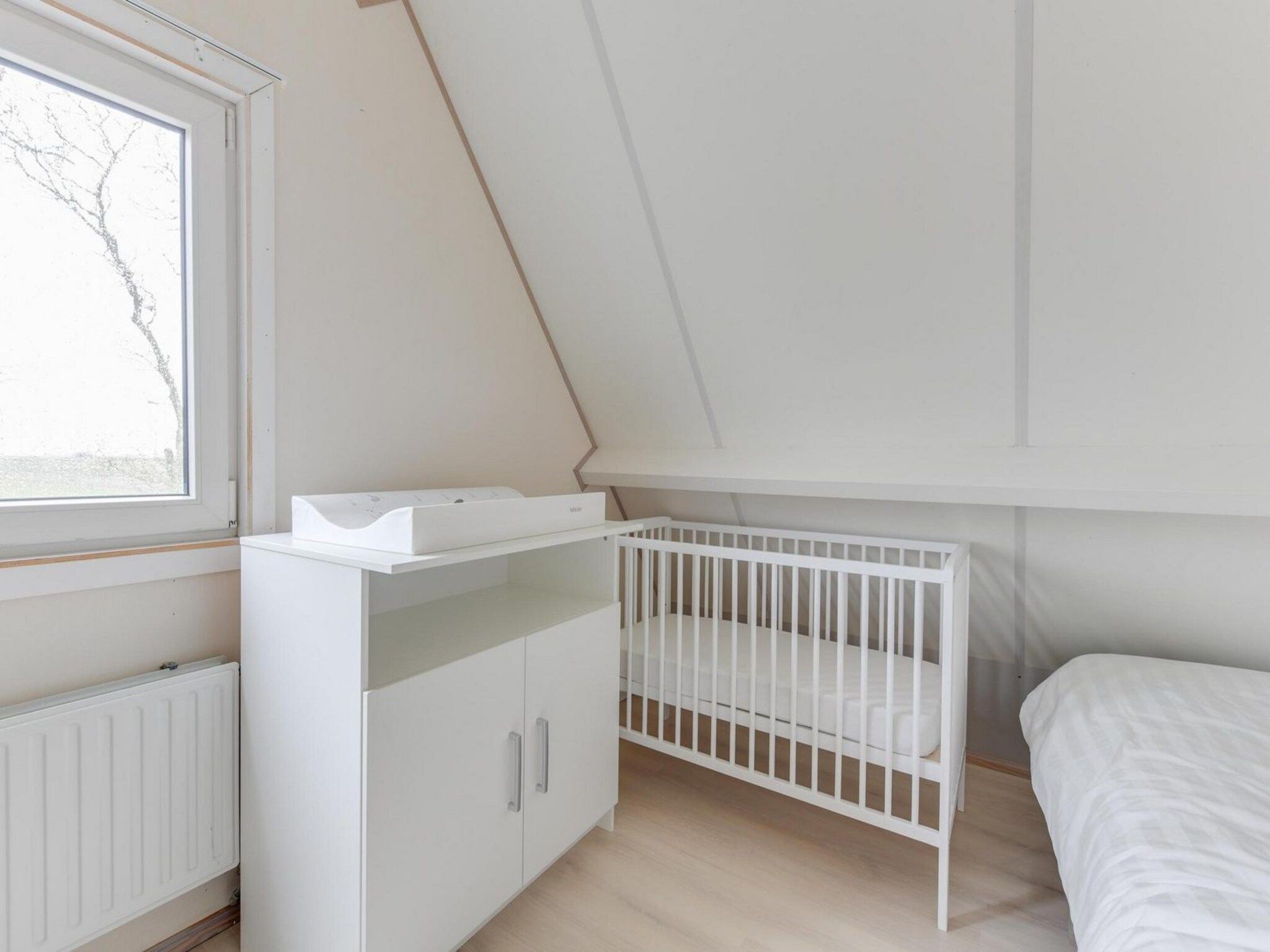 Een slaapkamer van Gudea 1 in Sint Maartensbrug