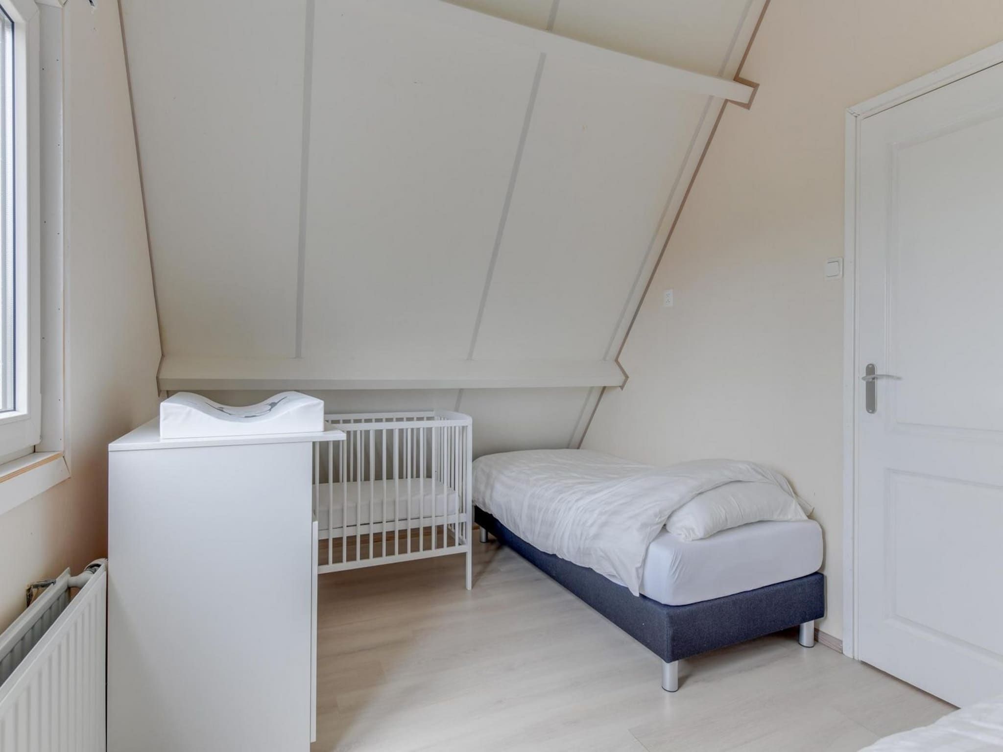Een slaapkamer van Gudea 1 in Sint Maartensbrug