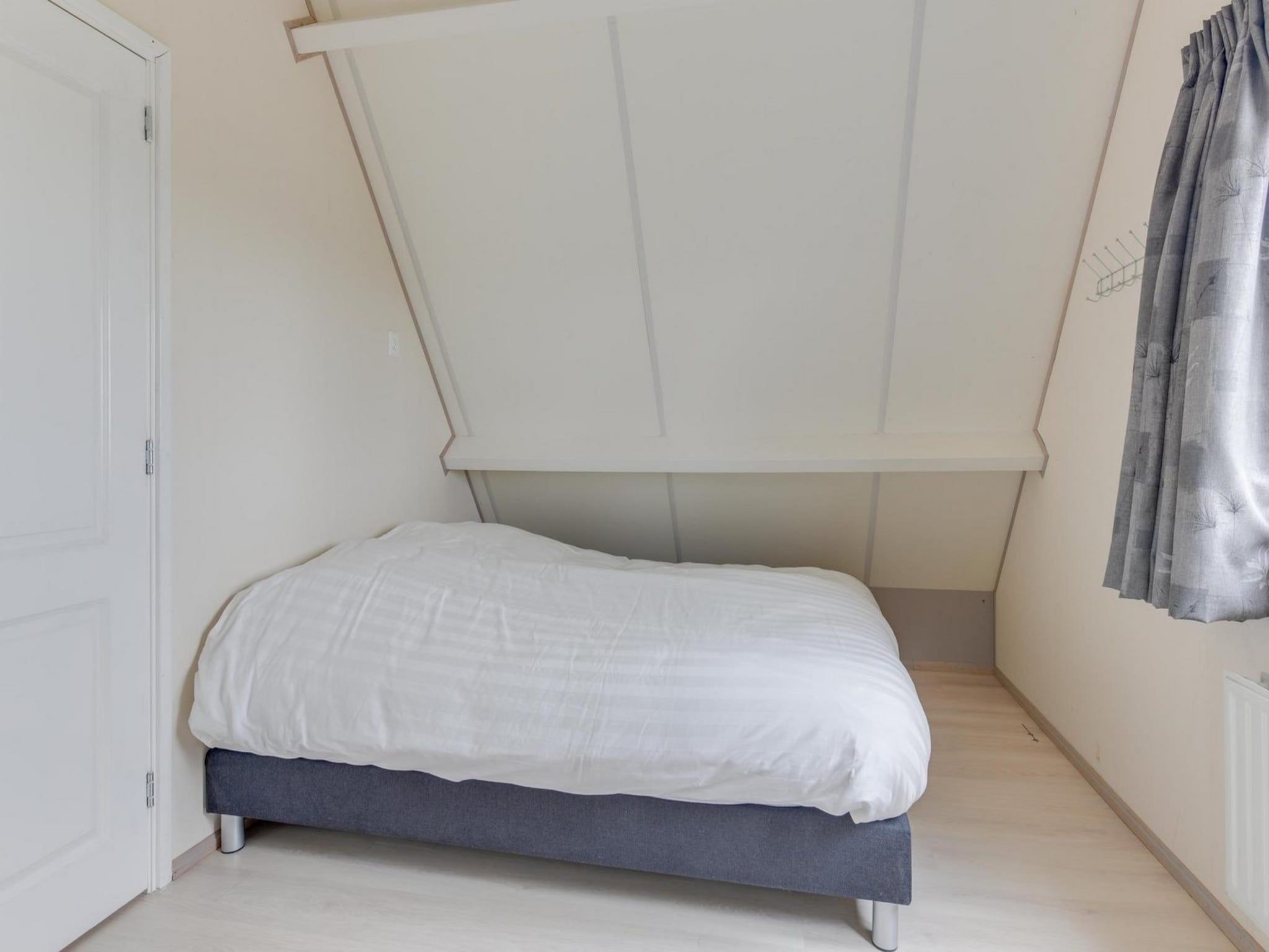 Een slaapkamer van Gudea 1 in Sint Maartensbrug