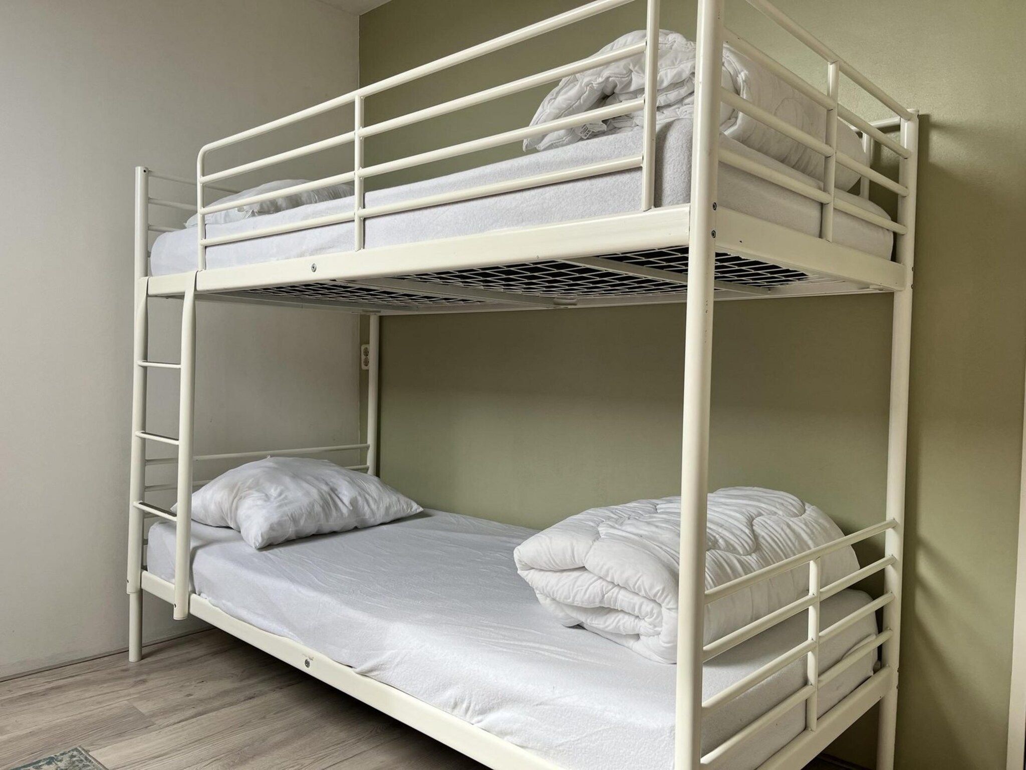 Een slaapkamer van Sint Maartensweg 38 in Sint Maartensvlotbrug