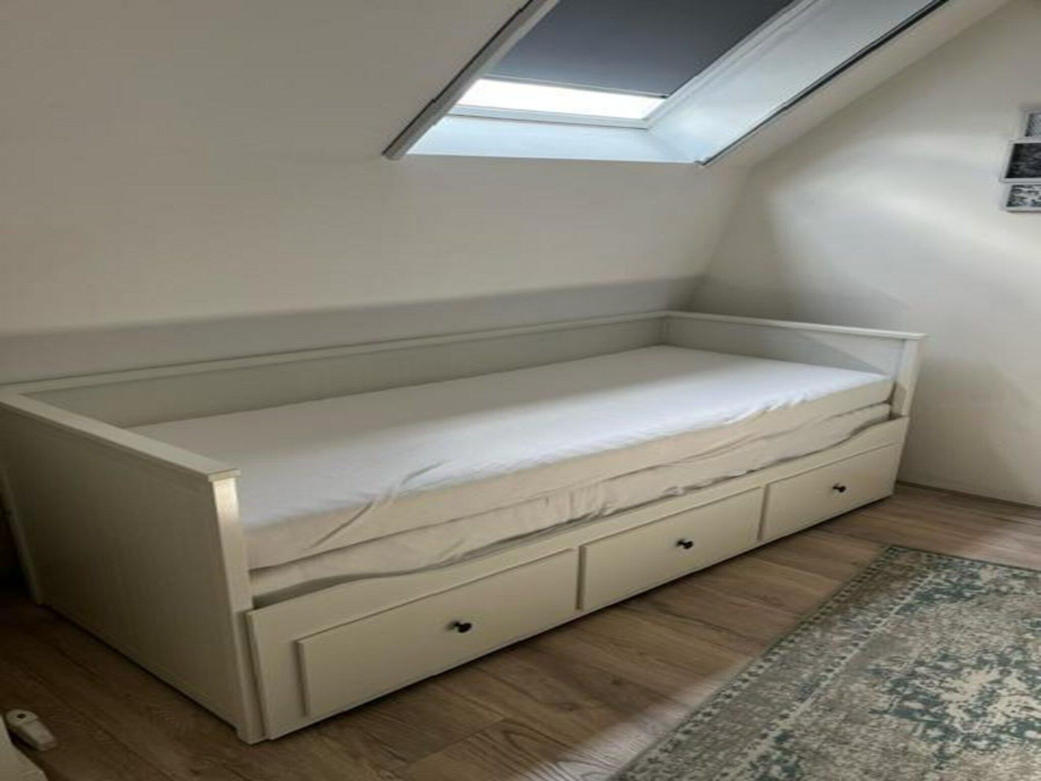 Een slaapkamer van Sint Maartensweg 38 in Sint Maartensvlotbrug