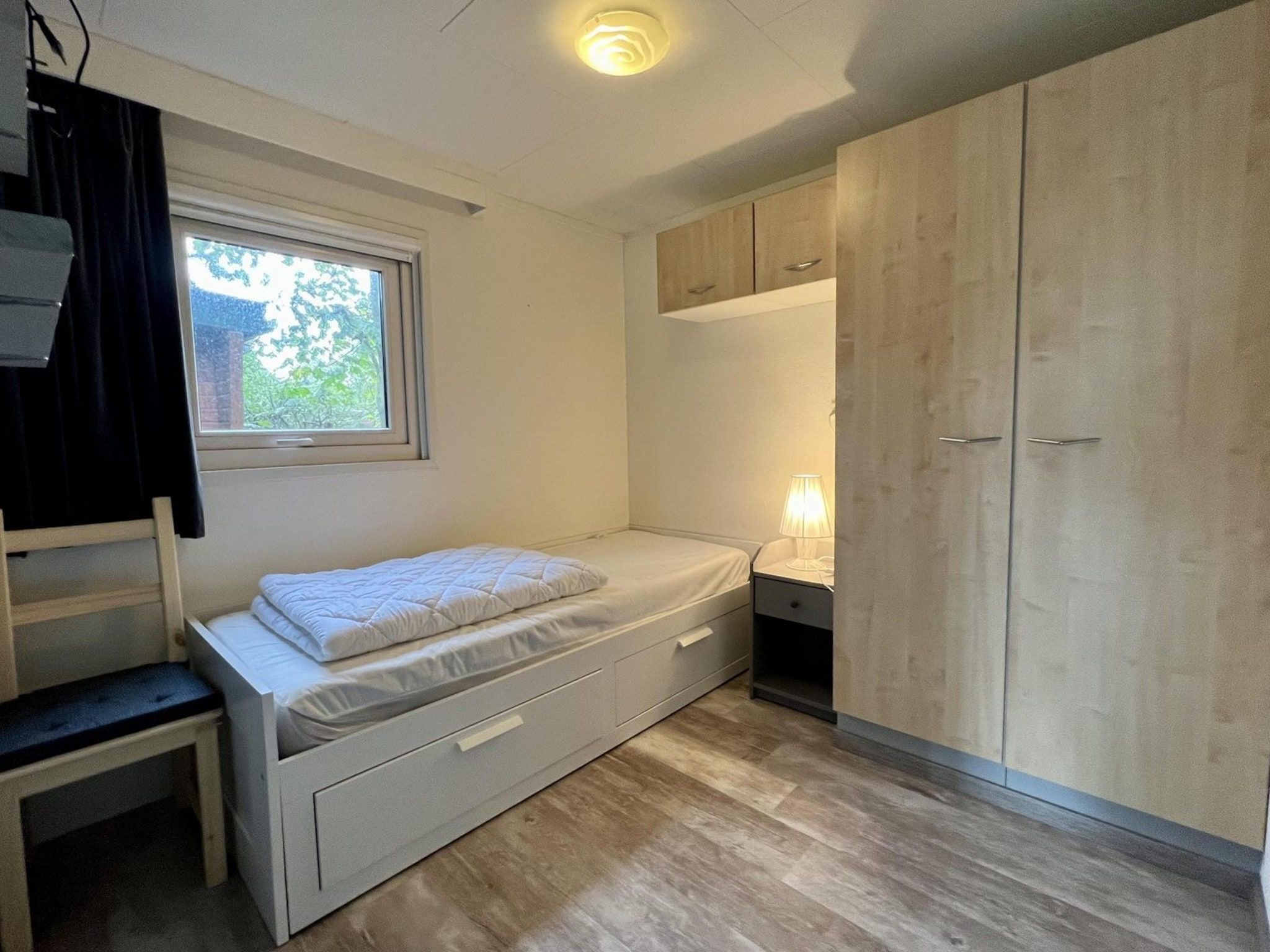 Een slaapkamer van Campanula 208 in Sint Maartenszee