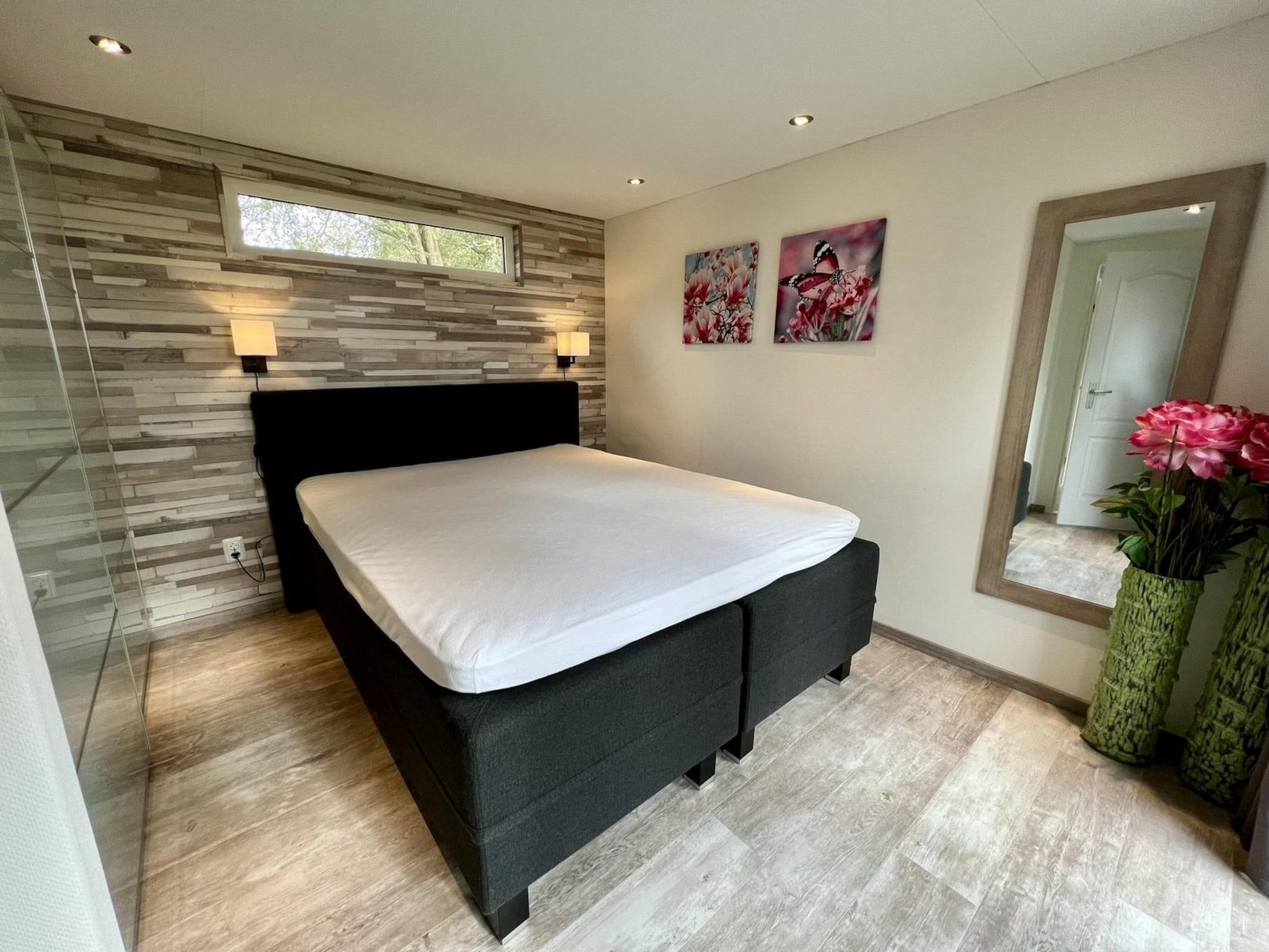 Een slaapkamer van Campanula 208 in Sint Maartenszee