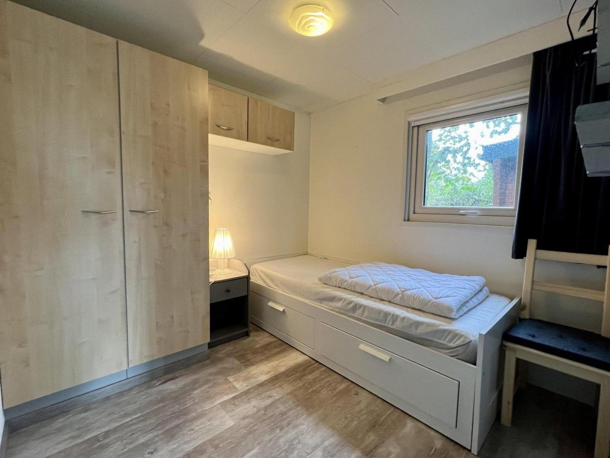 Een slaapkamer van Campanula 208 in Sint Maartenszee