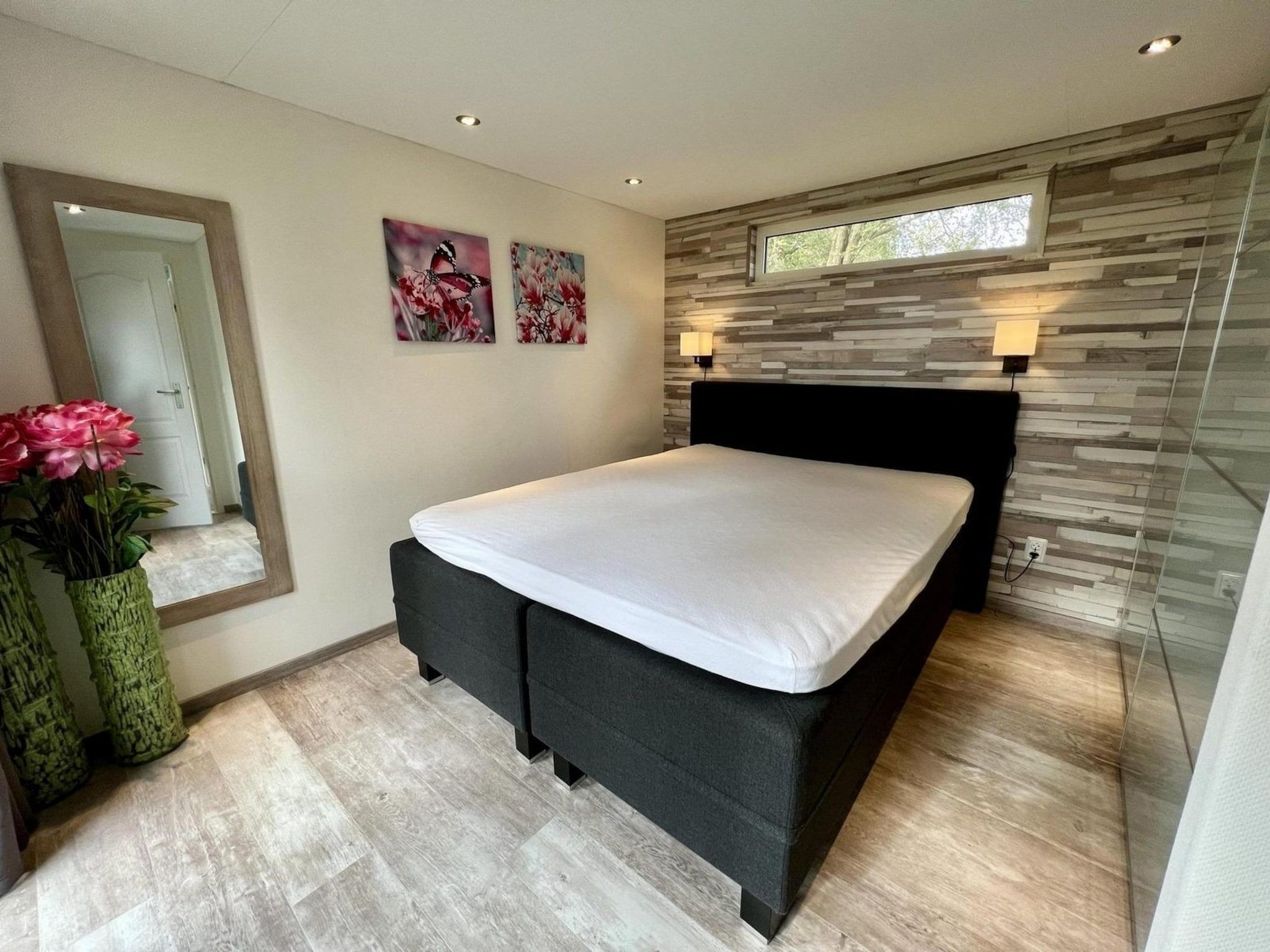 Een slaapkamer van Campanula 208 in Sint Maartenszee