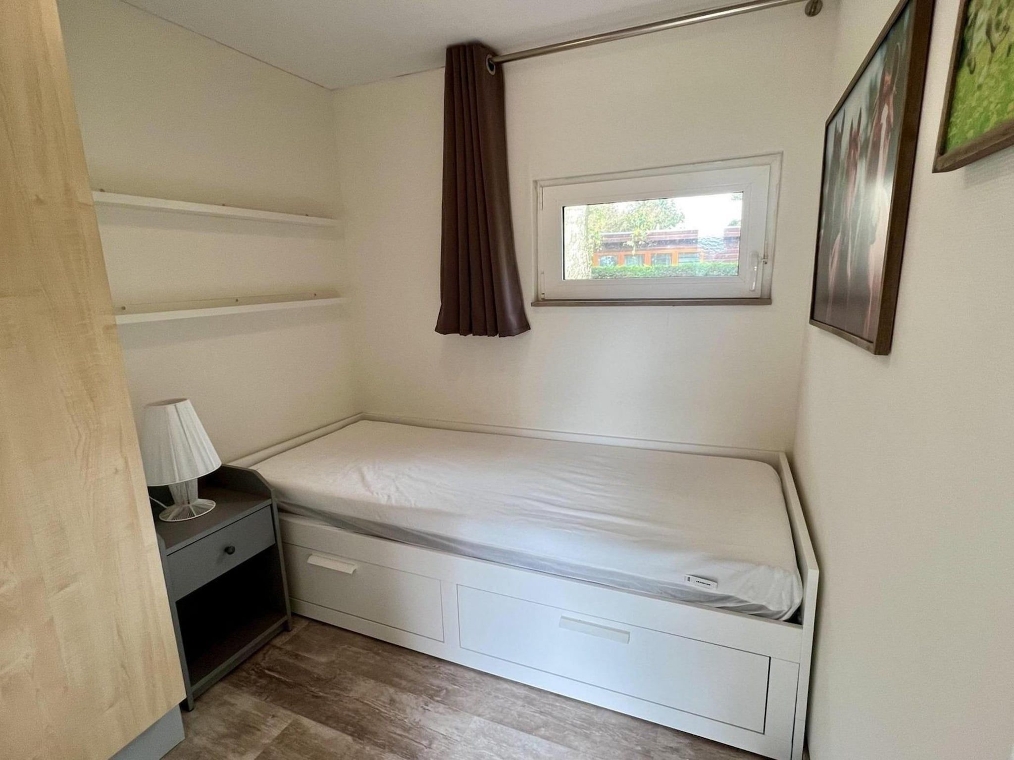 Een slaapkamer van Campanula 208 in Sint Maartenszee